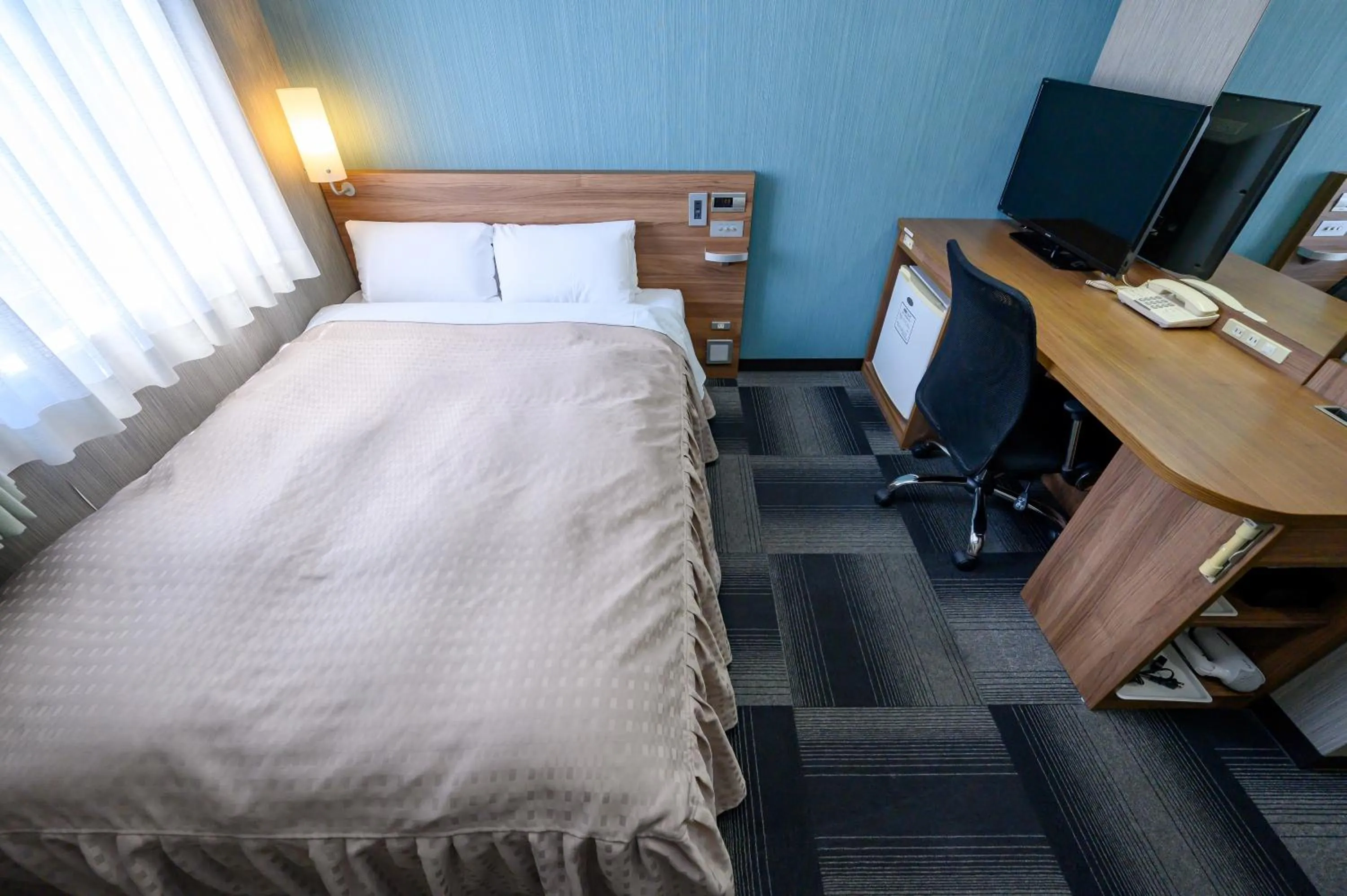 Photo of the whole room, Bed in Hotel Econo Kameyama