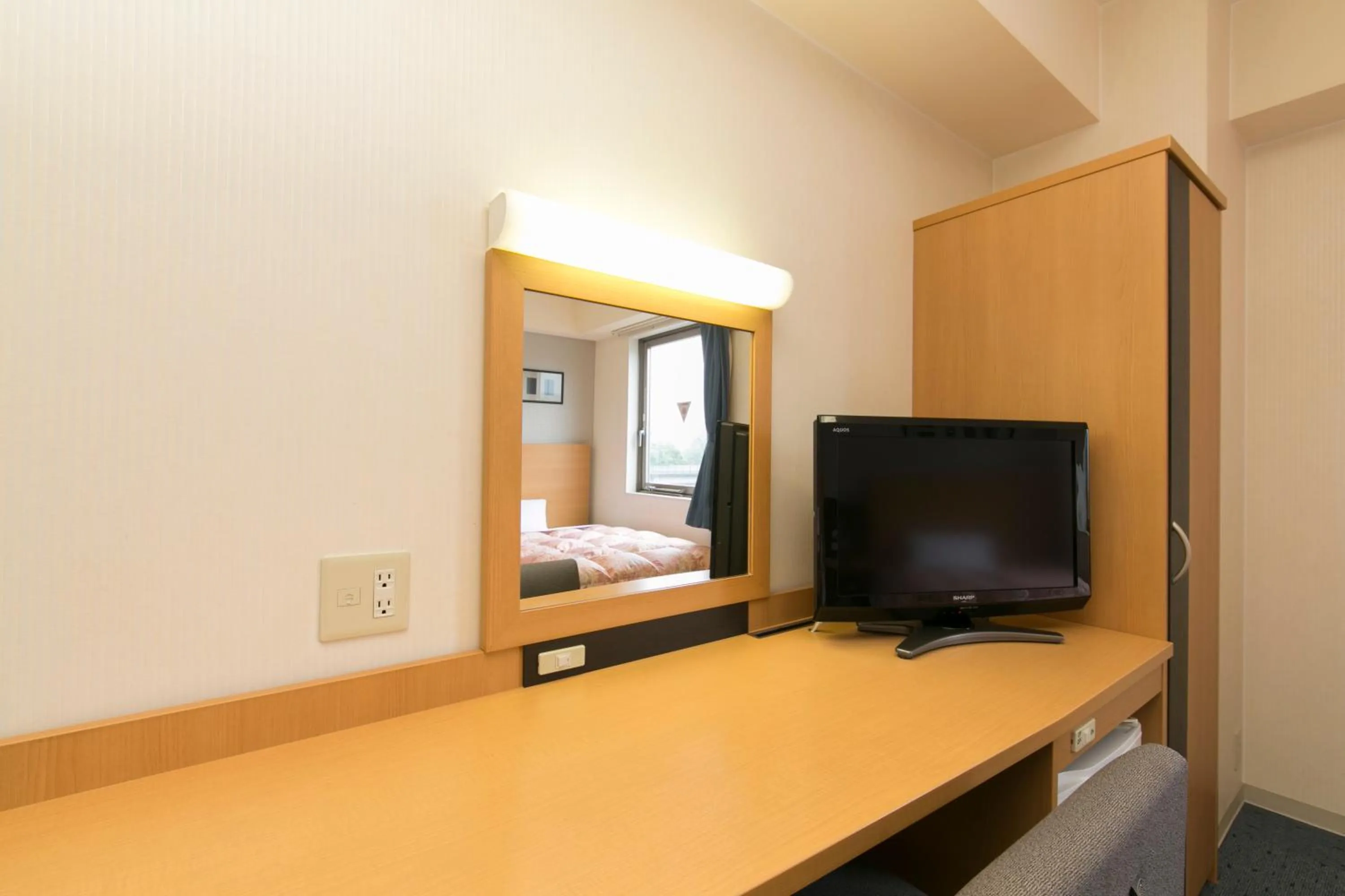 TV and multimedia in Hotel Econo Taki