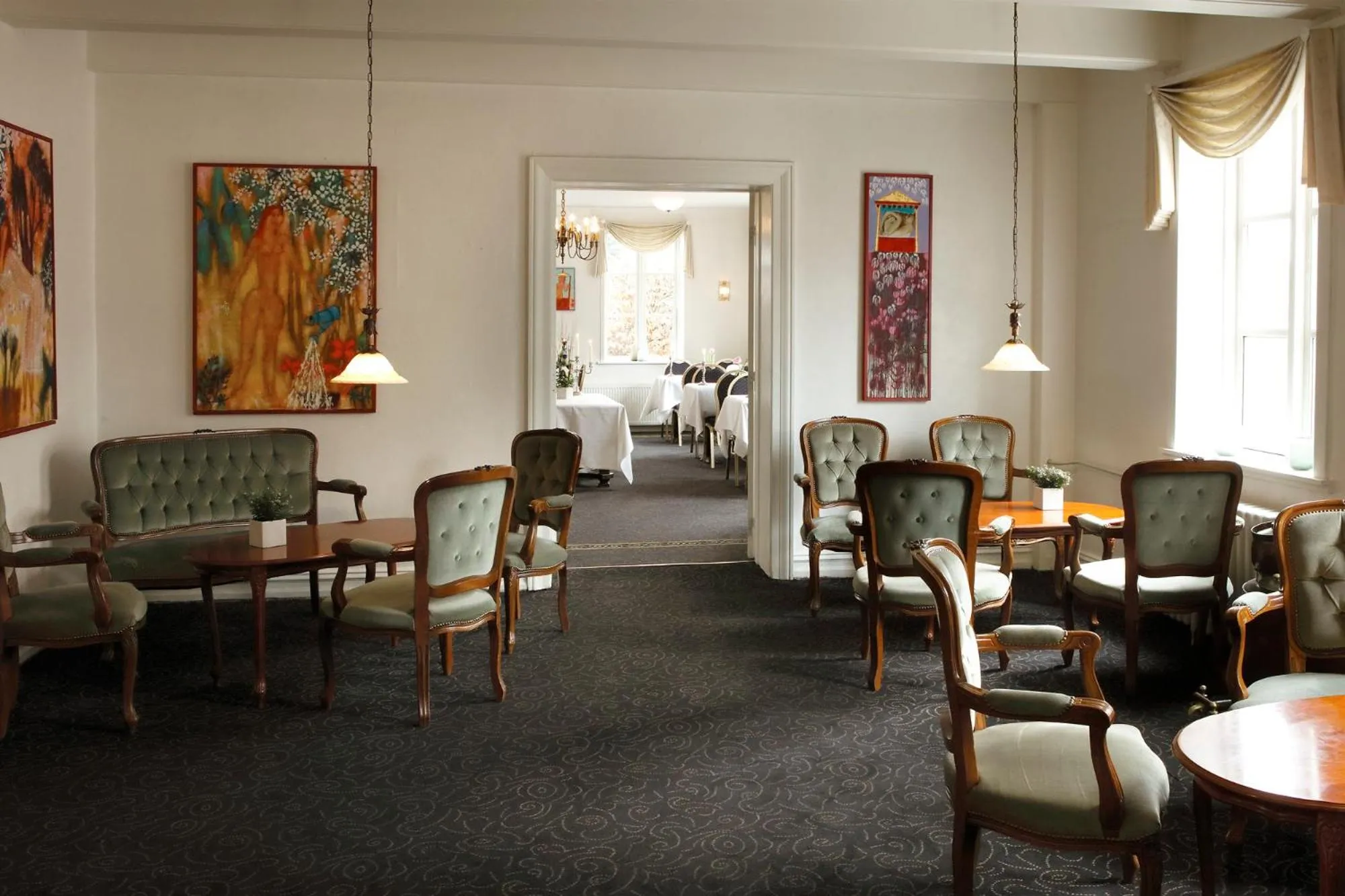 Communal lounge/ TV room in Aars Hotel