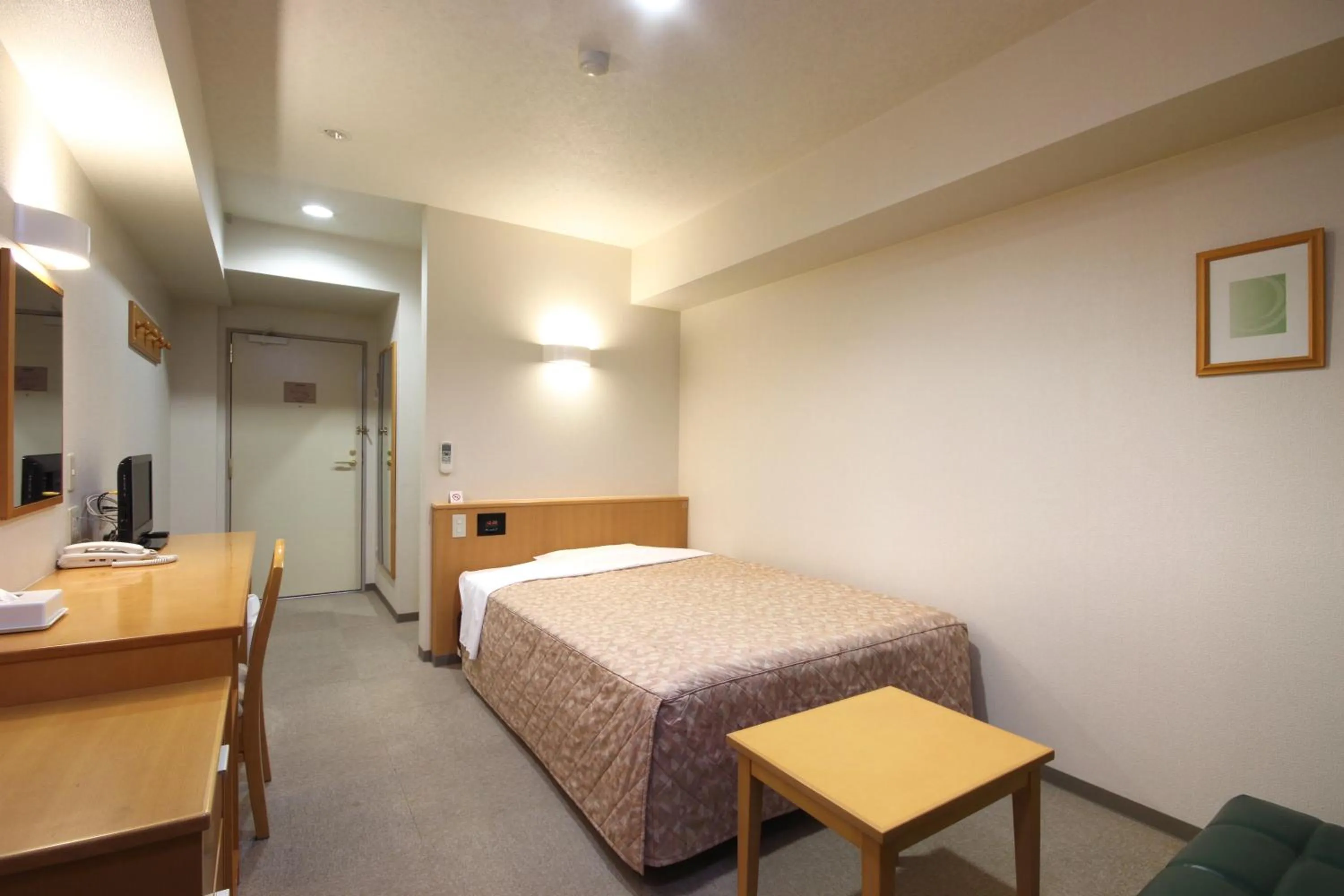 Photo of the whole room, Bed in Best Inn Uozu