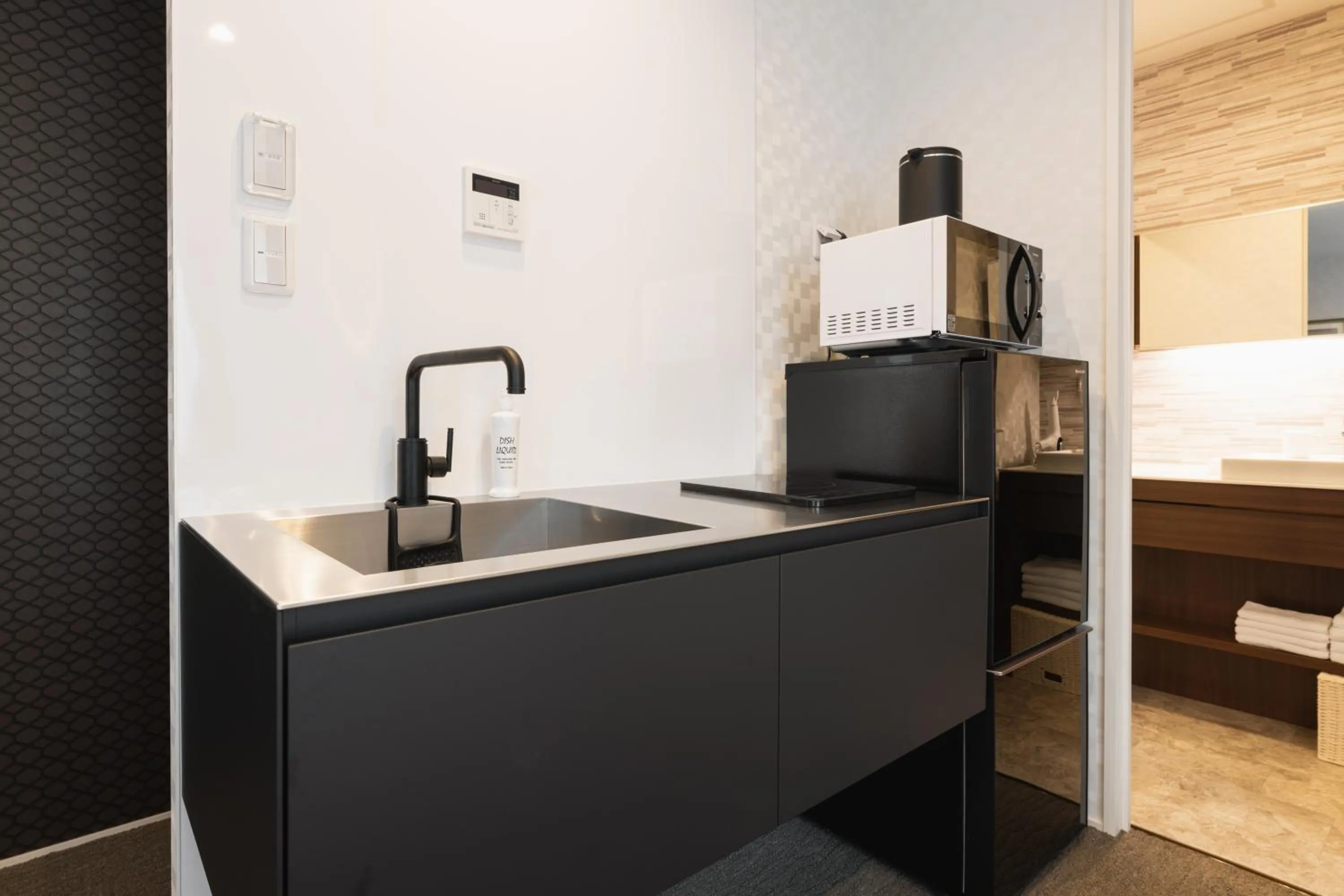 Kitchen or kitchenette in GRAND BASE Nagasaki Ekimae