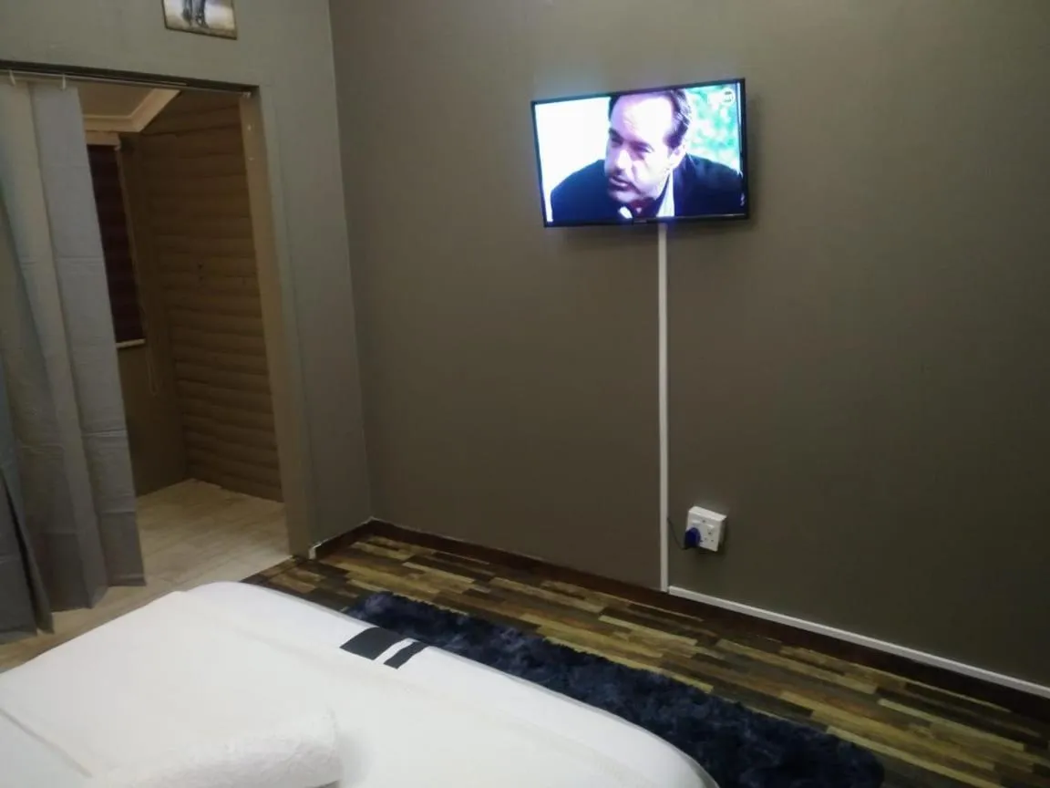 Bed in Bruno Comfort Suites