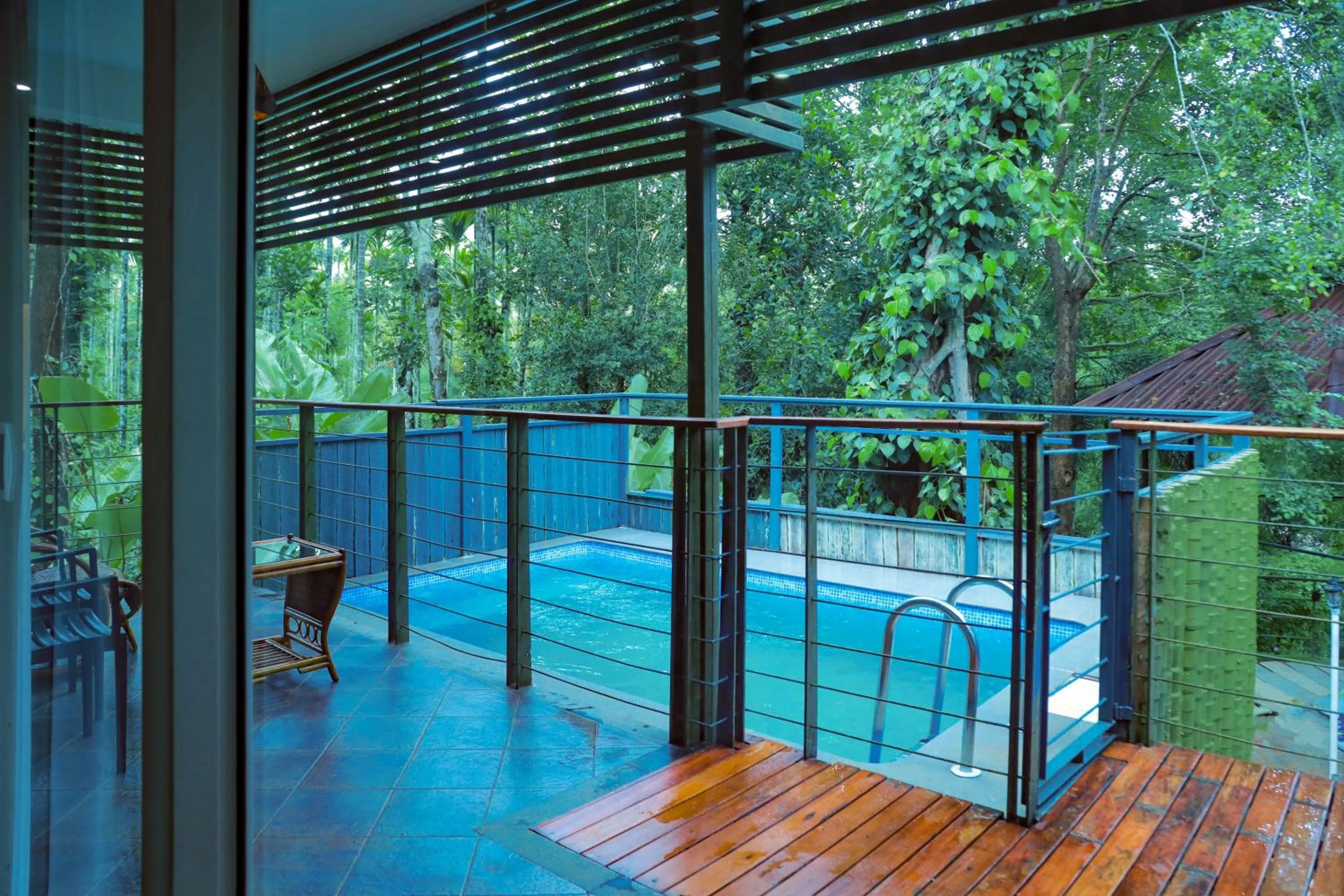 Balcony/Terrace in Kuruva Island Resort And Spa - By KABINI BREEZE