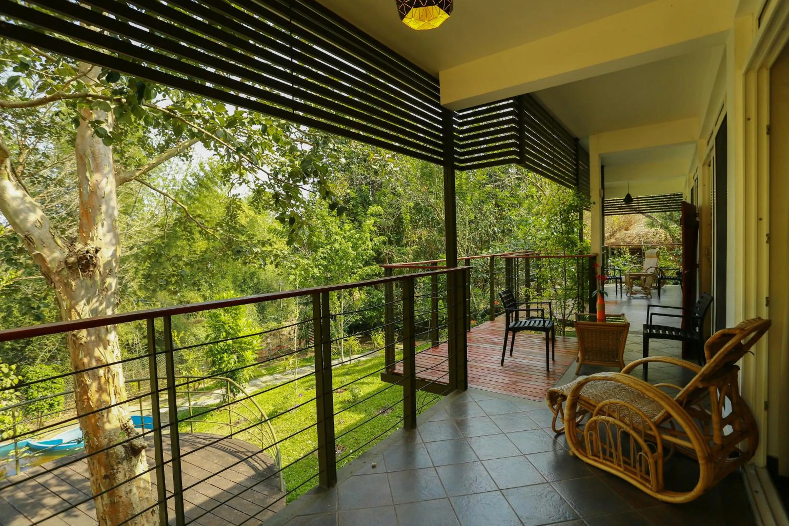 Balcony/Terrace in Kuruva Island Resort And Spa - By KABINI BREEZE