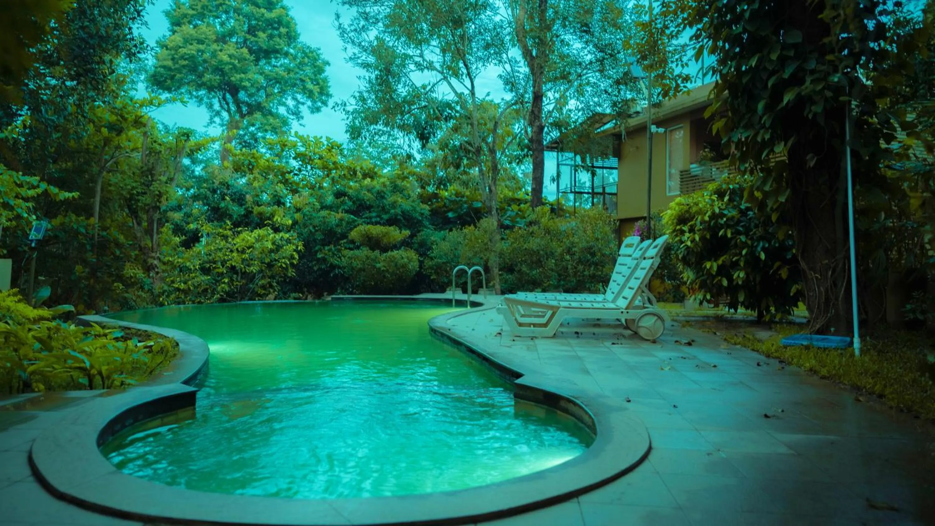 Pool view in Kuruva Island Resort And Spa - By KABINI BREEZE