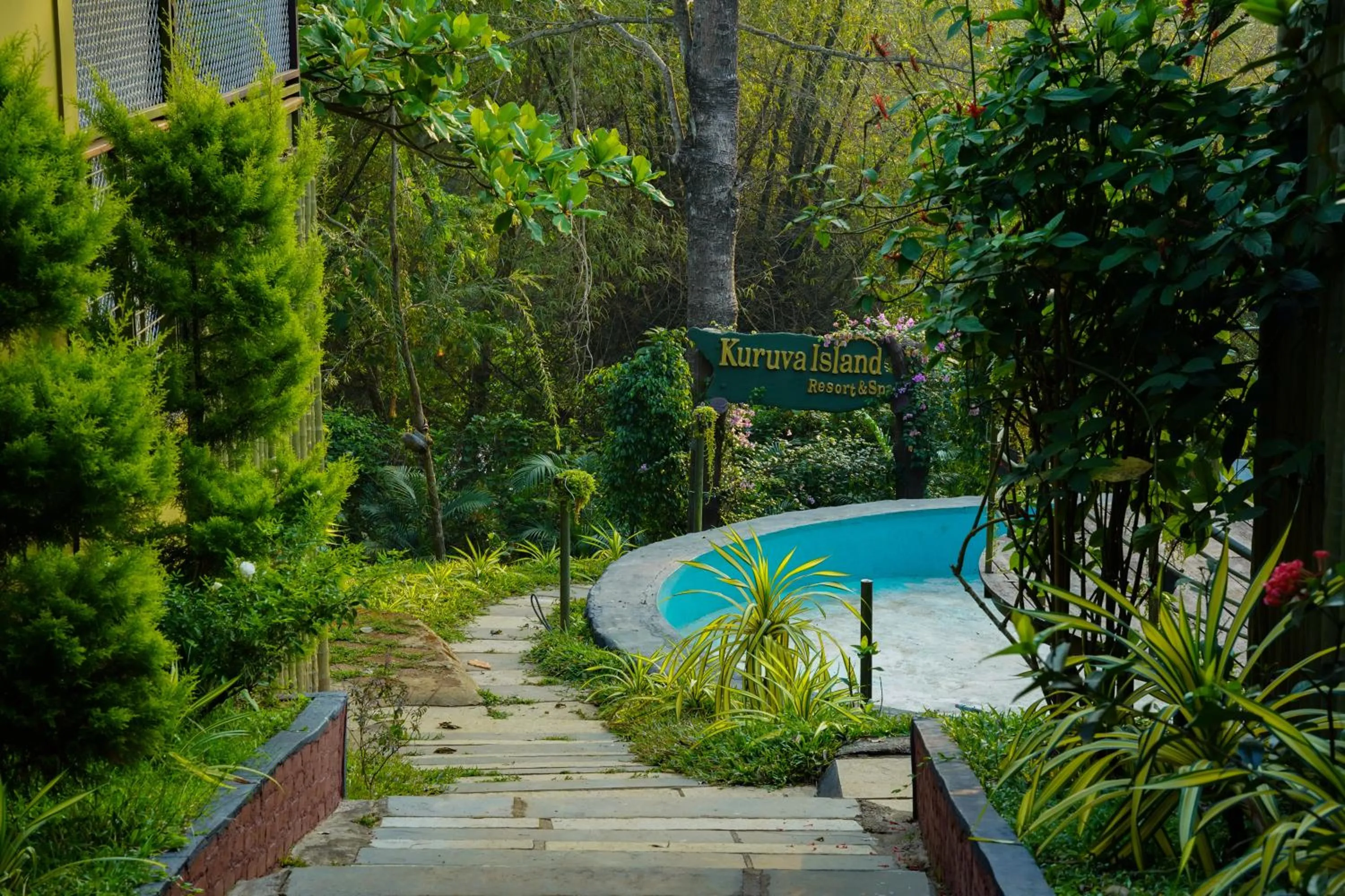 Garden in Kuruva Island Resort And Spa - By KABINI BREEZE