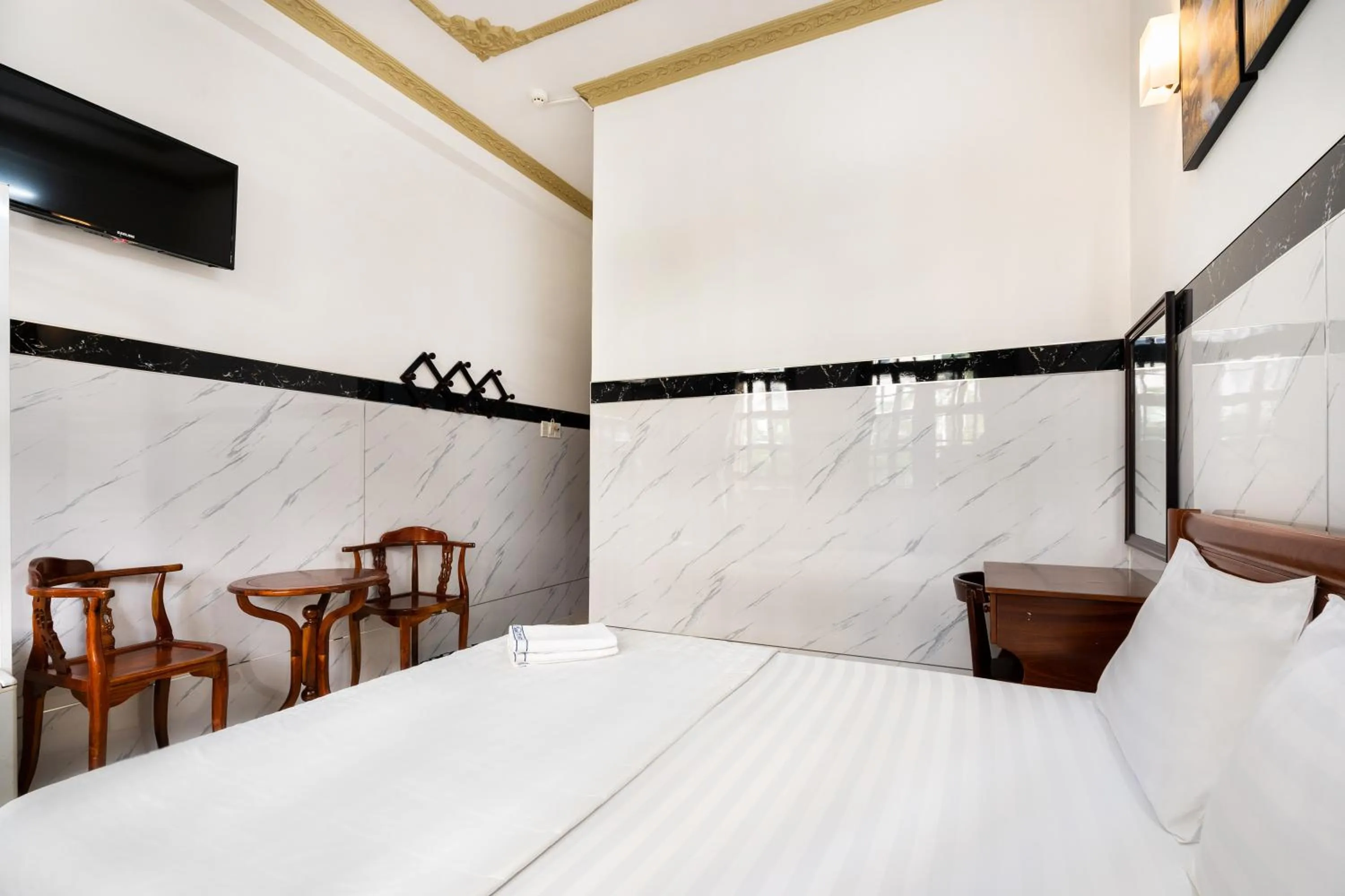 Bed in Lam Sơn Hotel