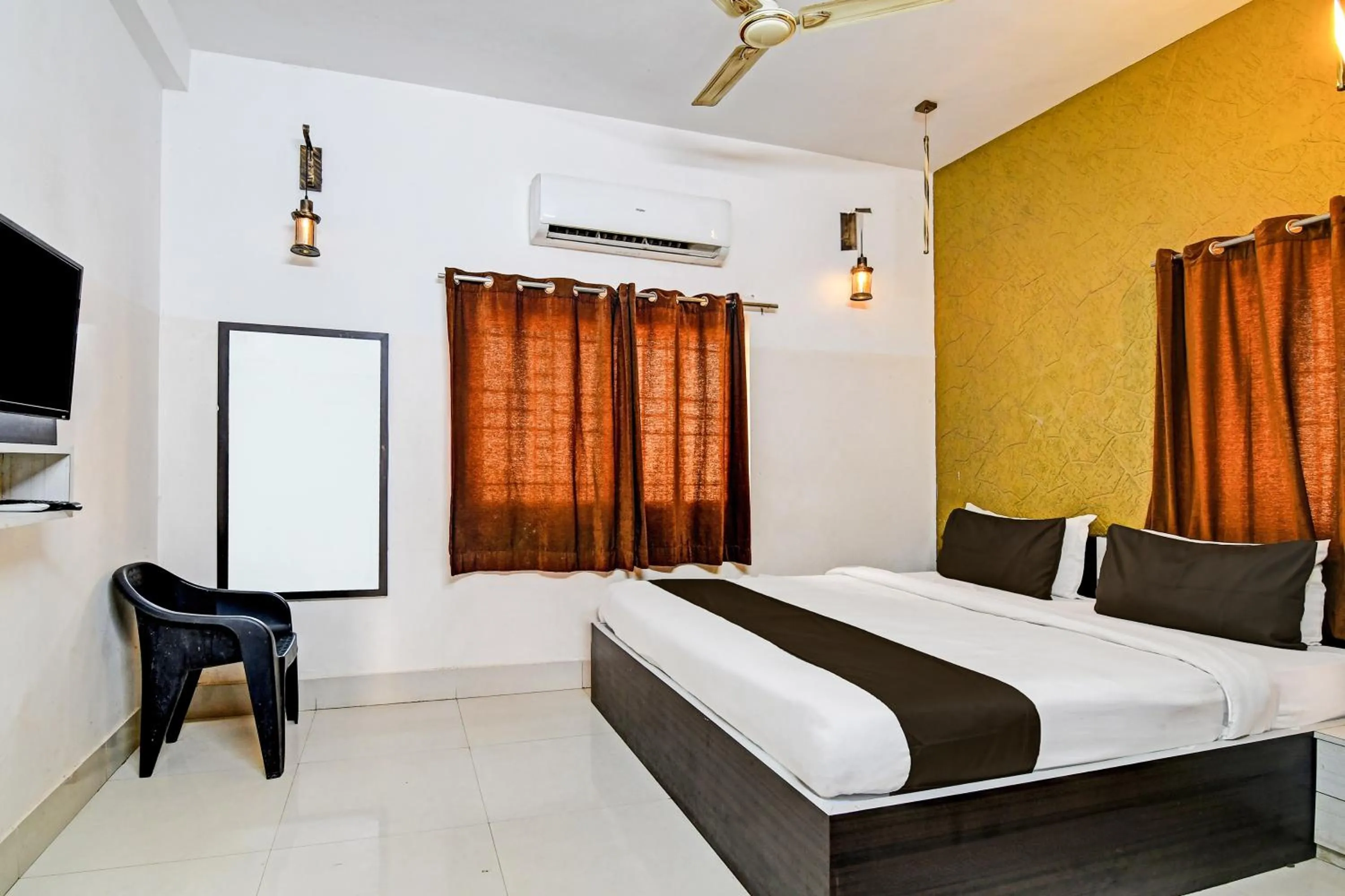 Bedroom in Hotel O Home Bm-x