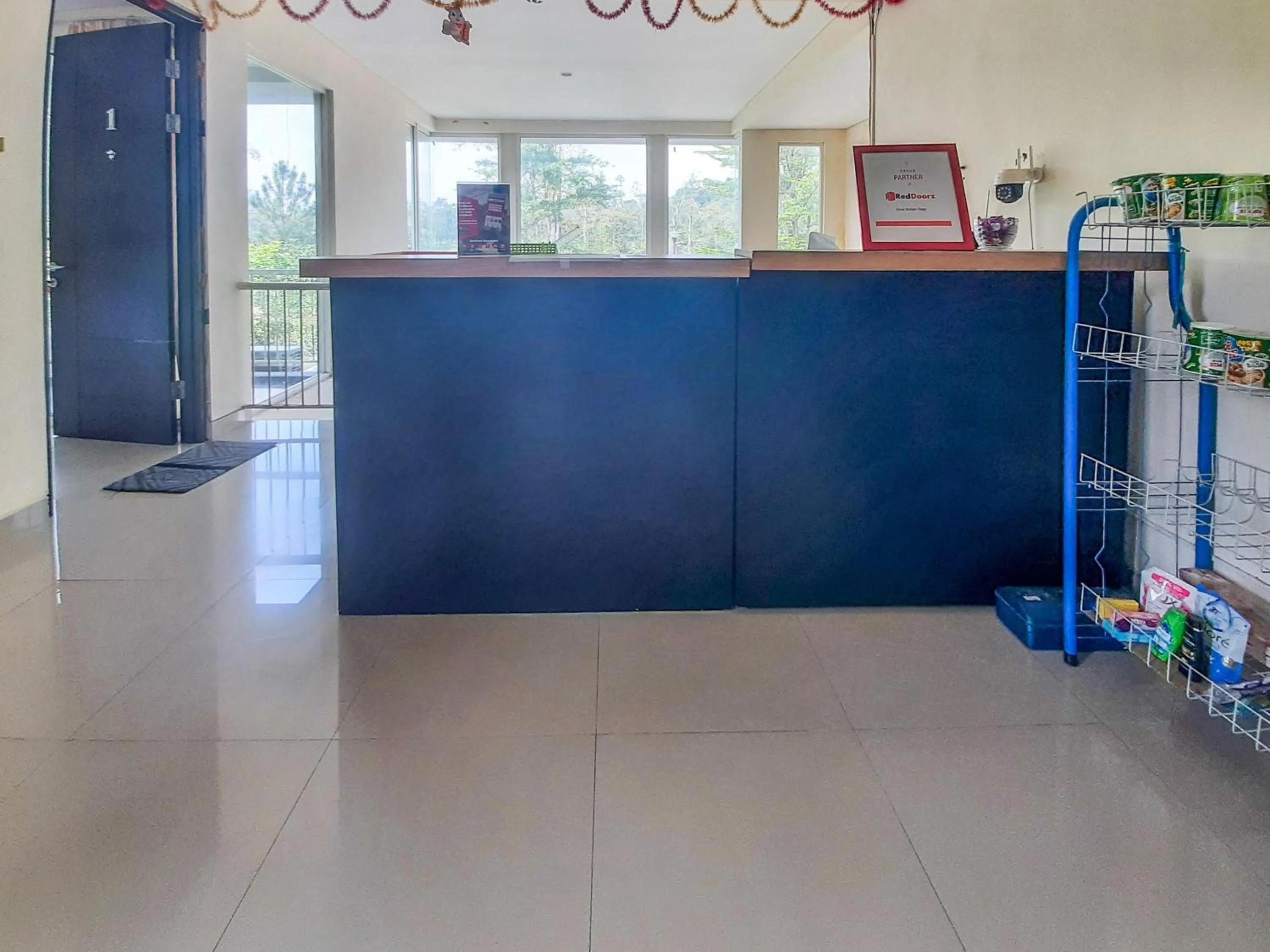 Lobby or reception in RedDoorz at Villa Taman Dayu Pandaan 2