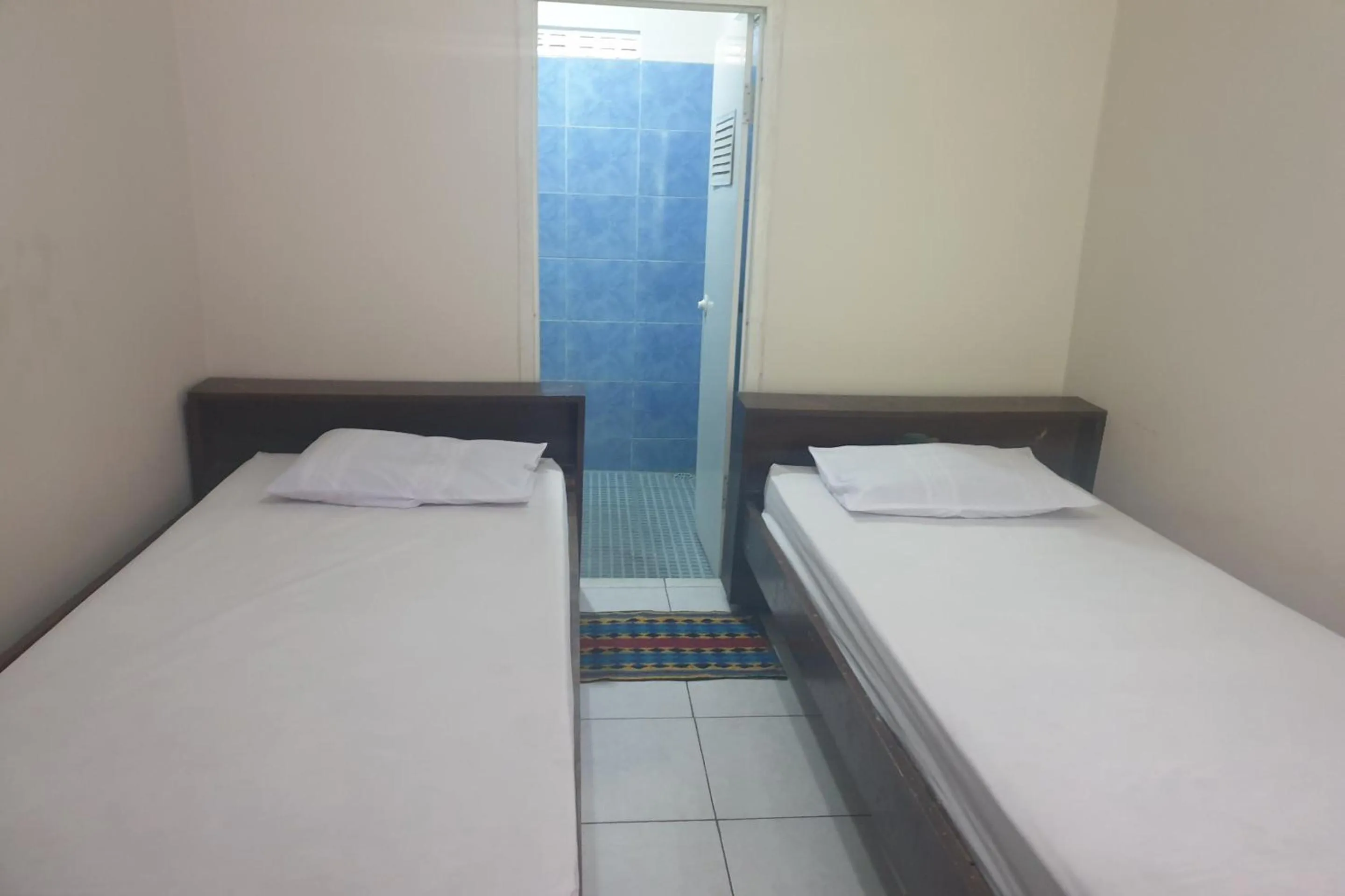 Bedroom, Bed in OYO Life 2090 Ratna Backpacker Syariah