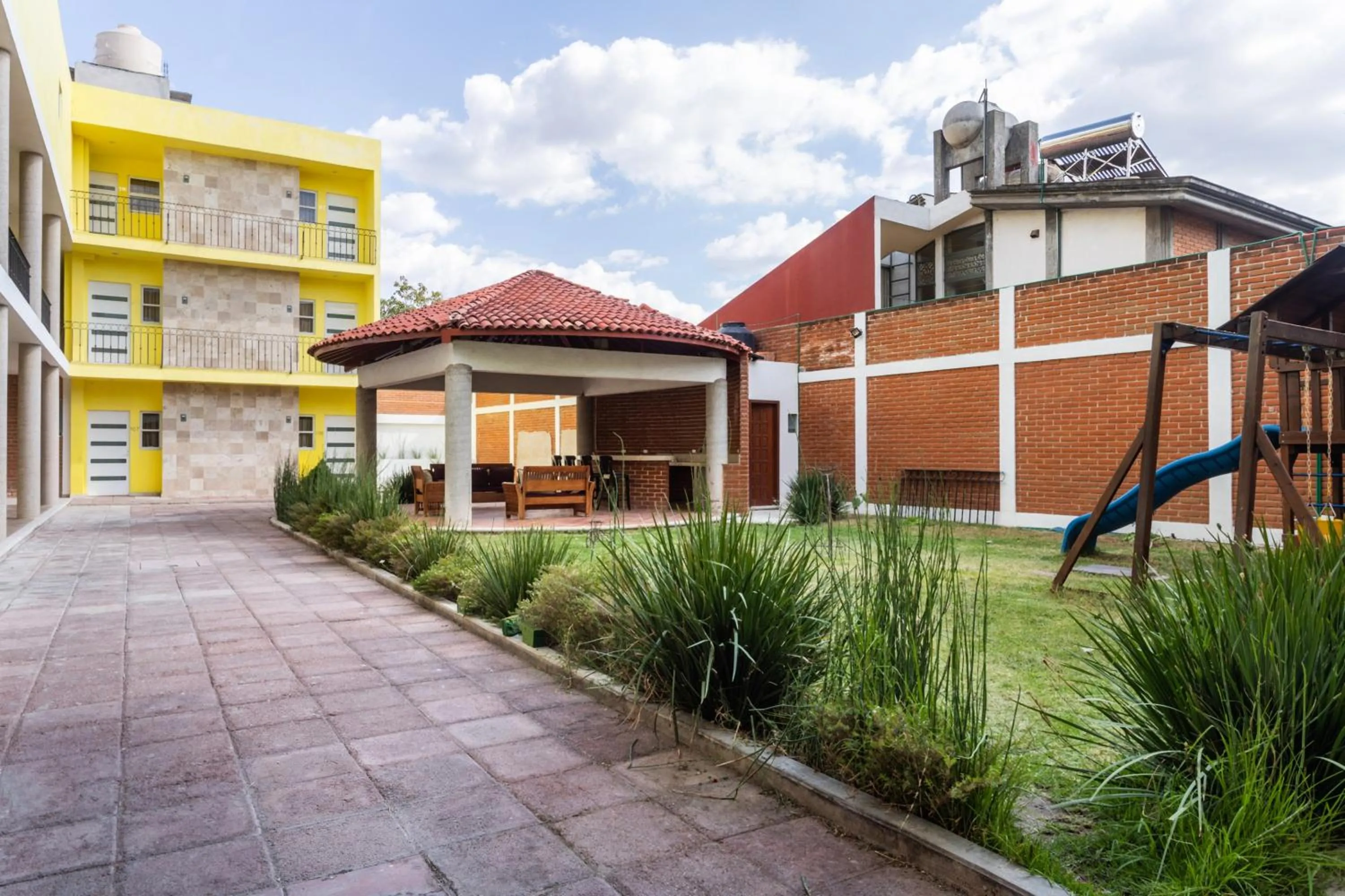 Property building in Capital O Hotel Emperadores Inn, Atlixco