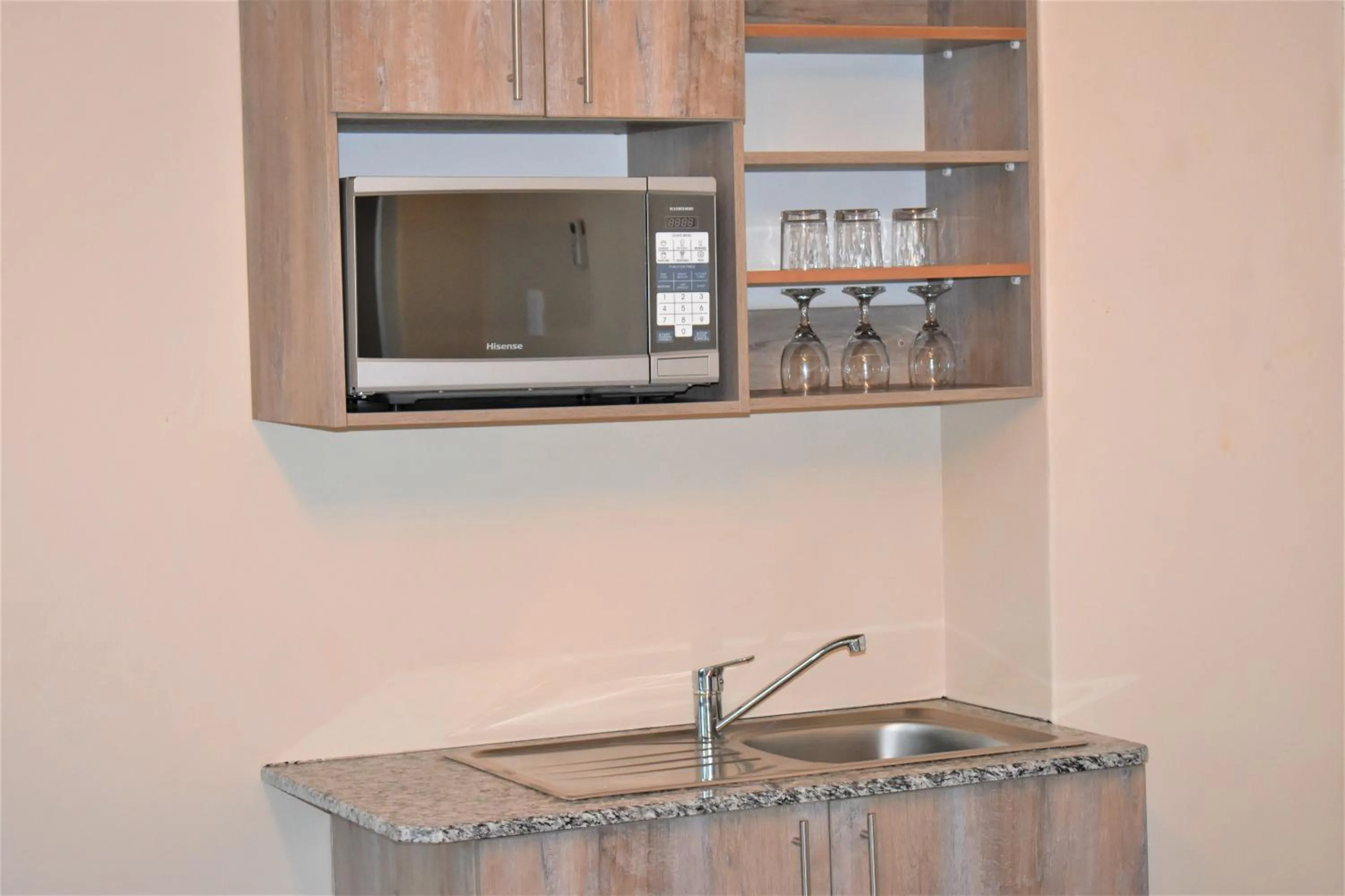 Kitchen or kitchenette in Prime Hotel