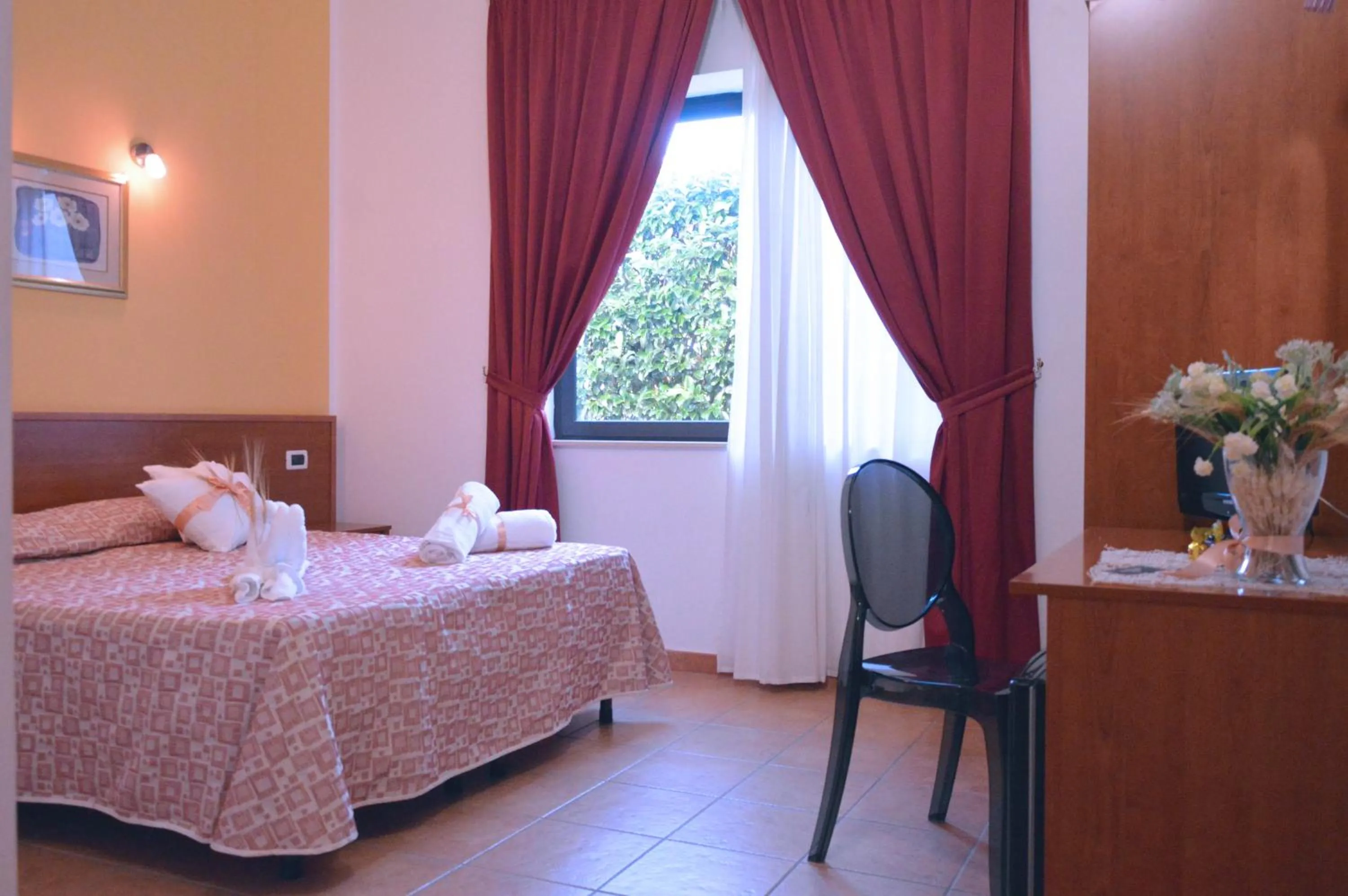 Photo of the whole room, Bed in Desusino Residence & Hotel