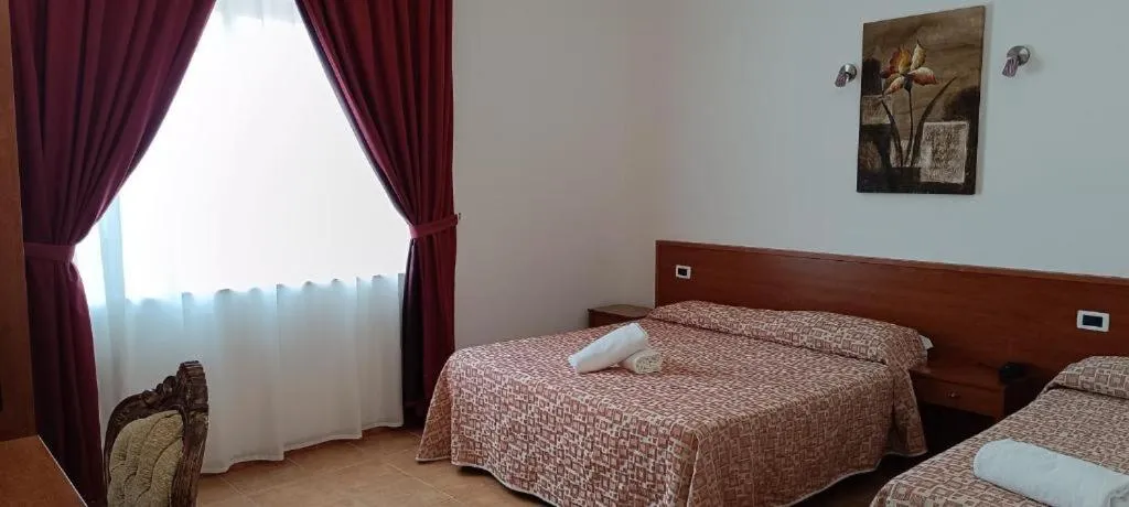 Bed in Desusino Residence & Hotel