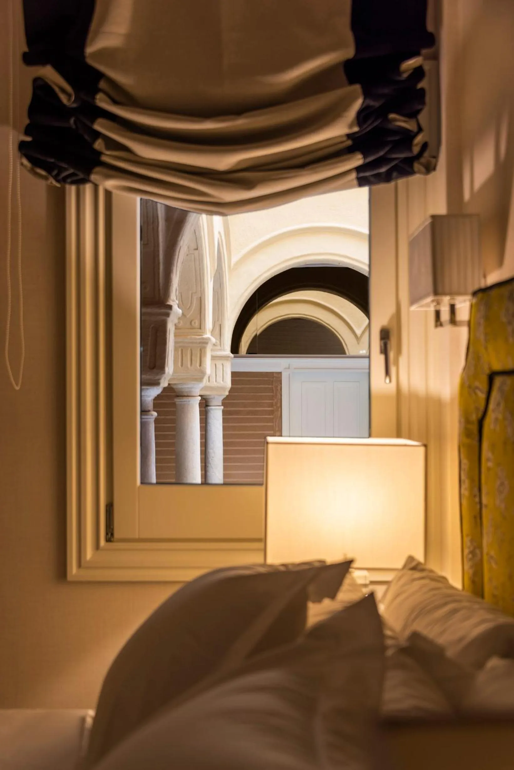 Bed in Casa de Triana Luxury Suites by Casa del Poeta