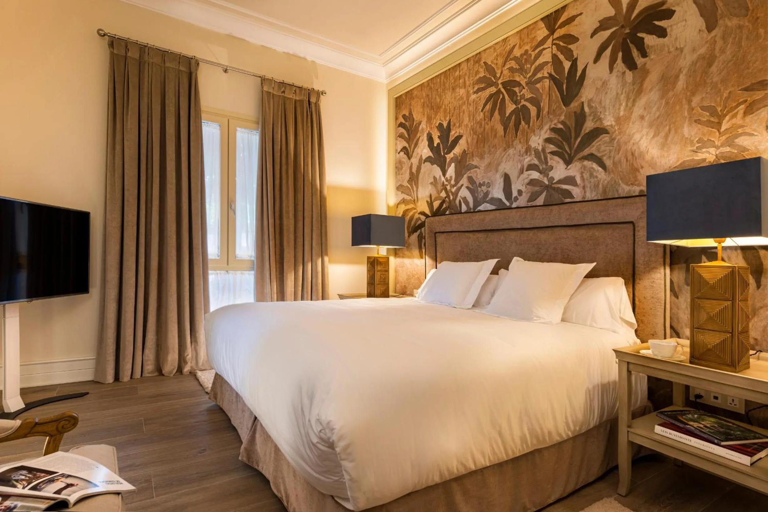 Bed in Casa de Triana Luxury Suites by Casa del Poeta