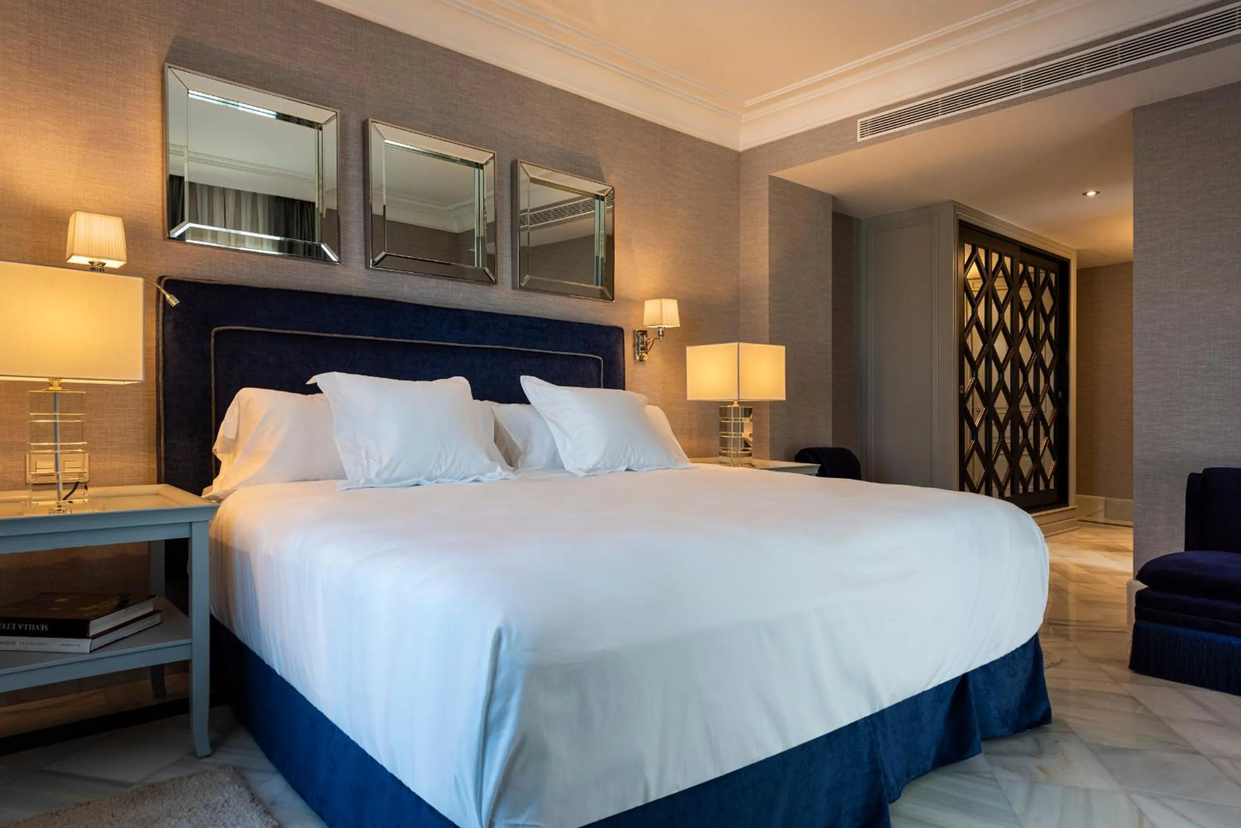 Bed in Casa de Triana Luxury Suites by Casa del Poeta