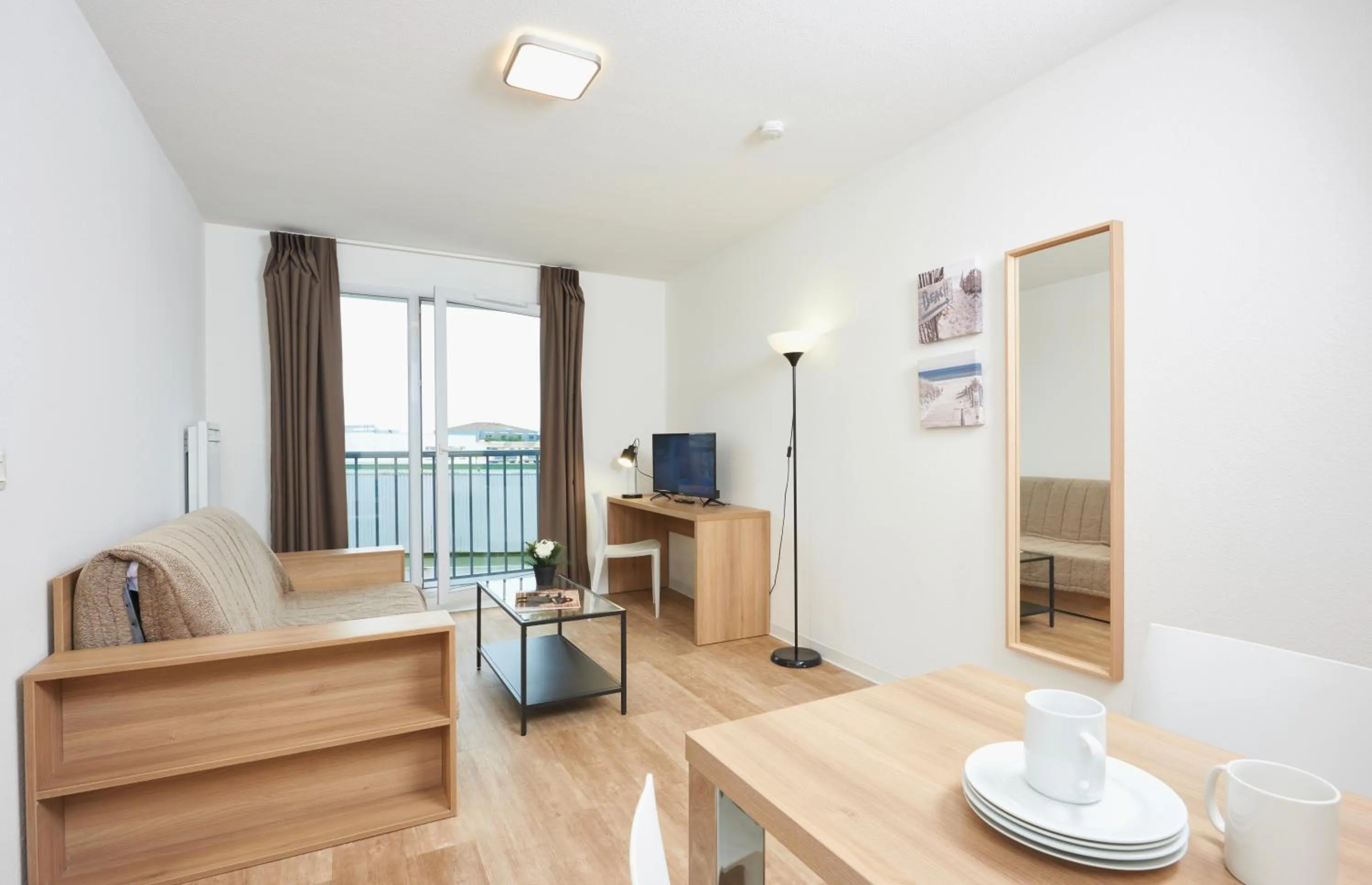 TV and multimedia in Ténéo Apparthotel Talence - Centre