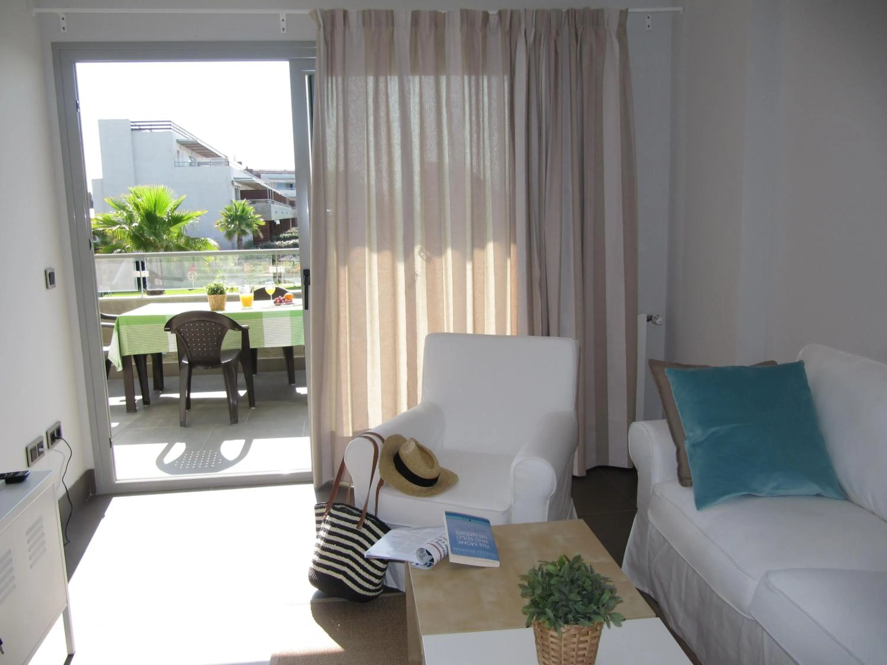 Seating area, Bed in Life Apartments El Rompido