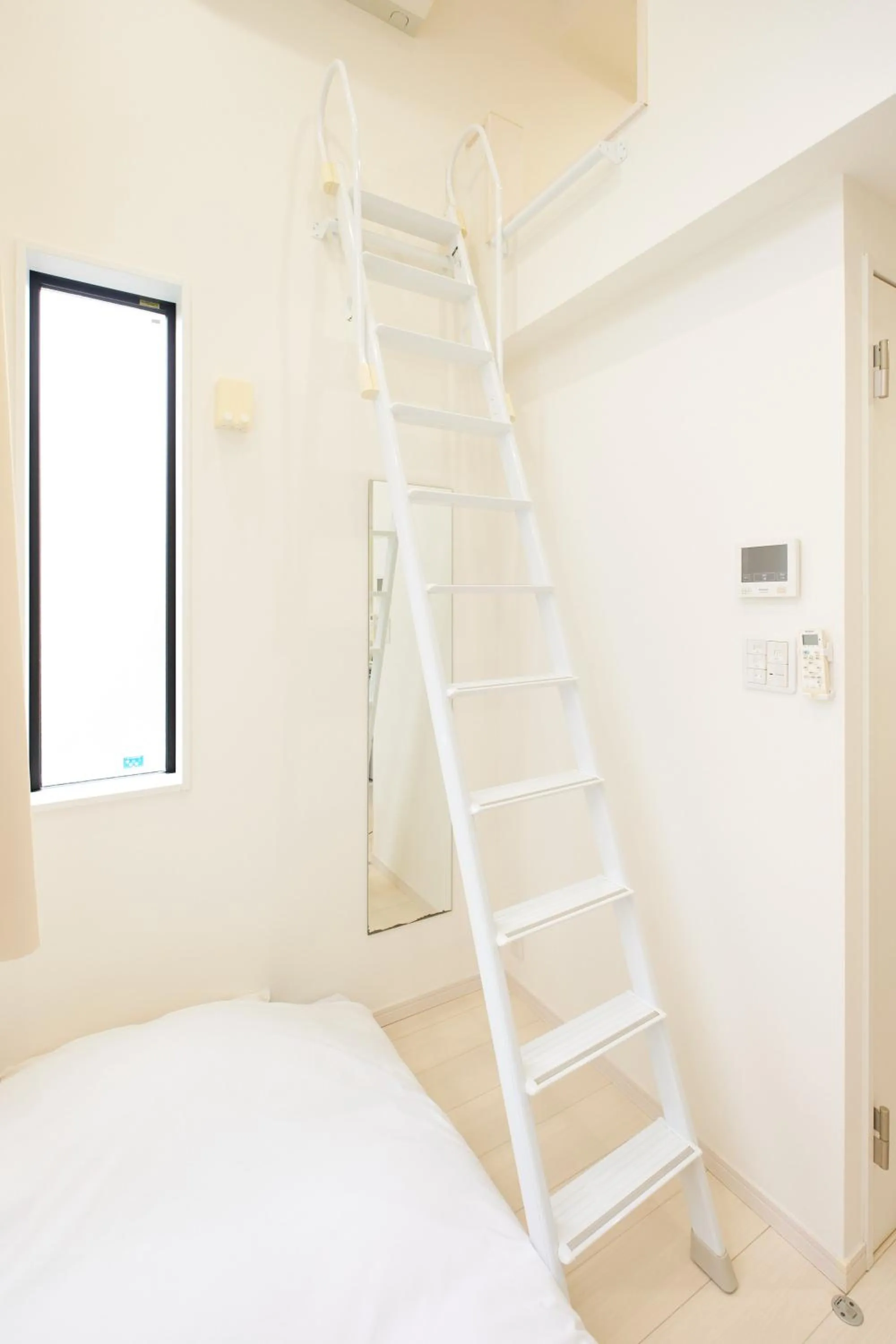 Photo of the whole room, Bed in Nano North Shinjuku Apartment by Tranova