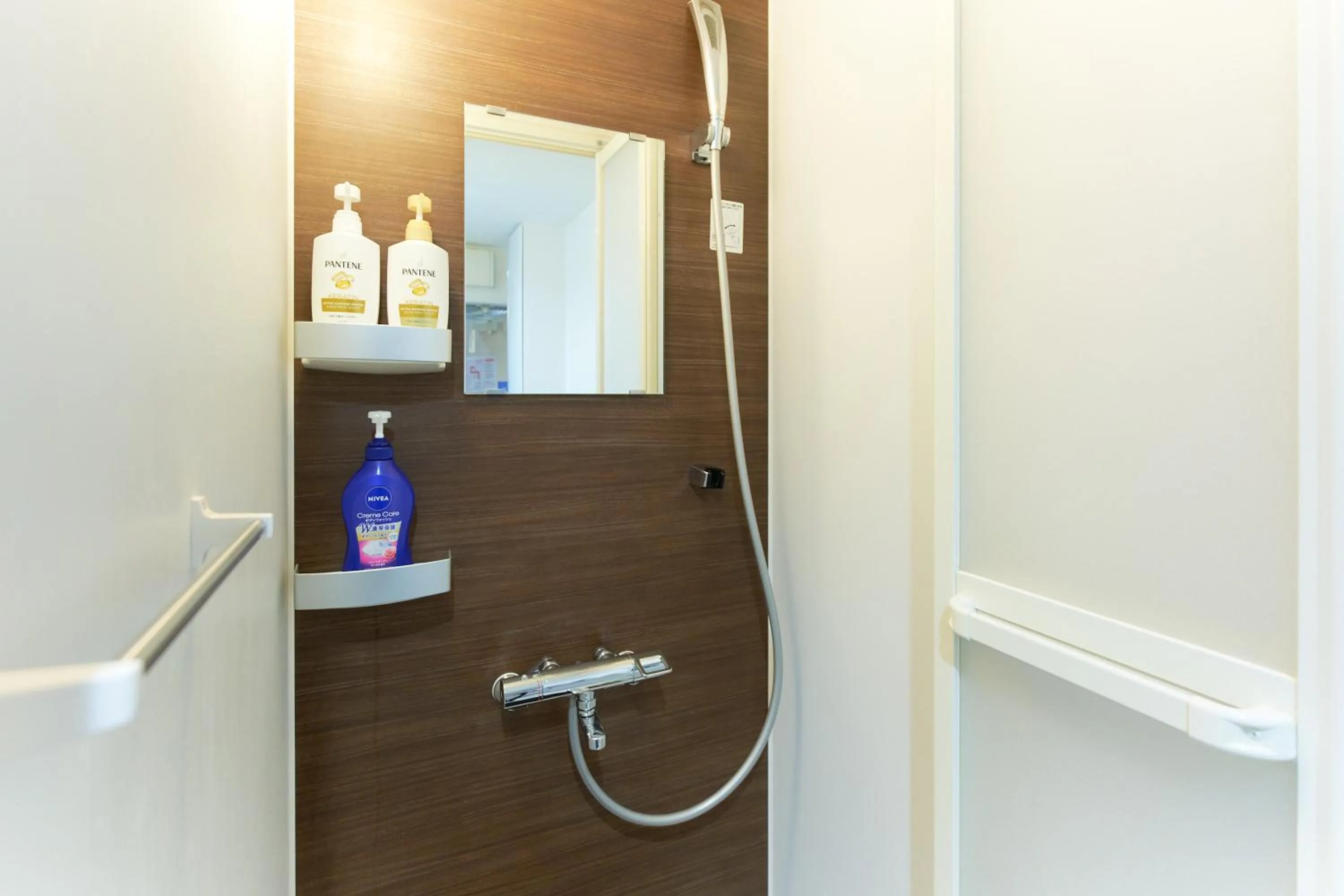 Shower in Nano North Shinjuku Apartment by Tranova