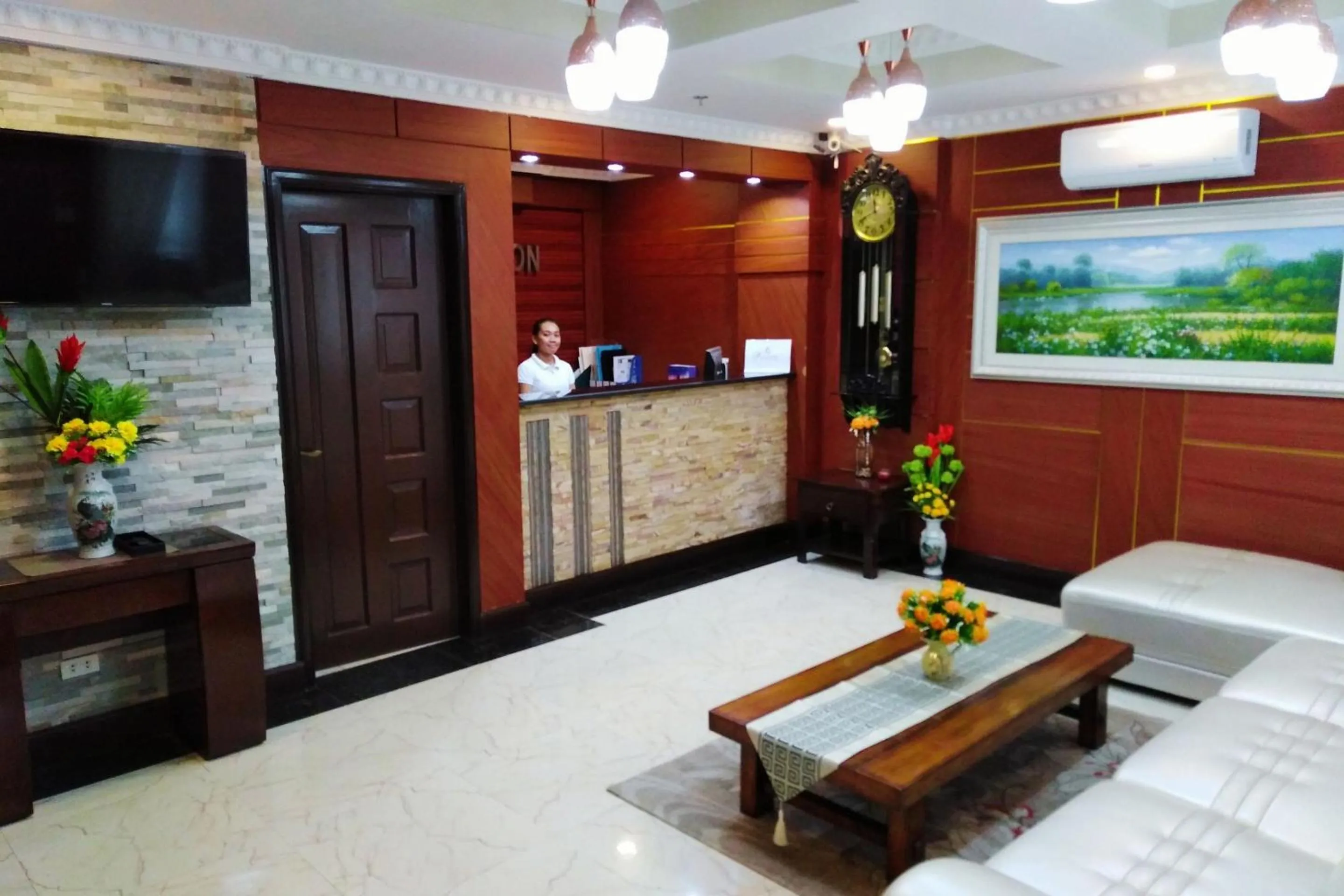 Lobby or reception in Venezia Suites Hotel Iloilo