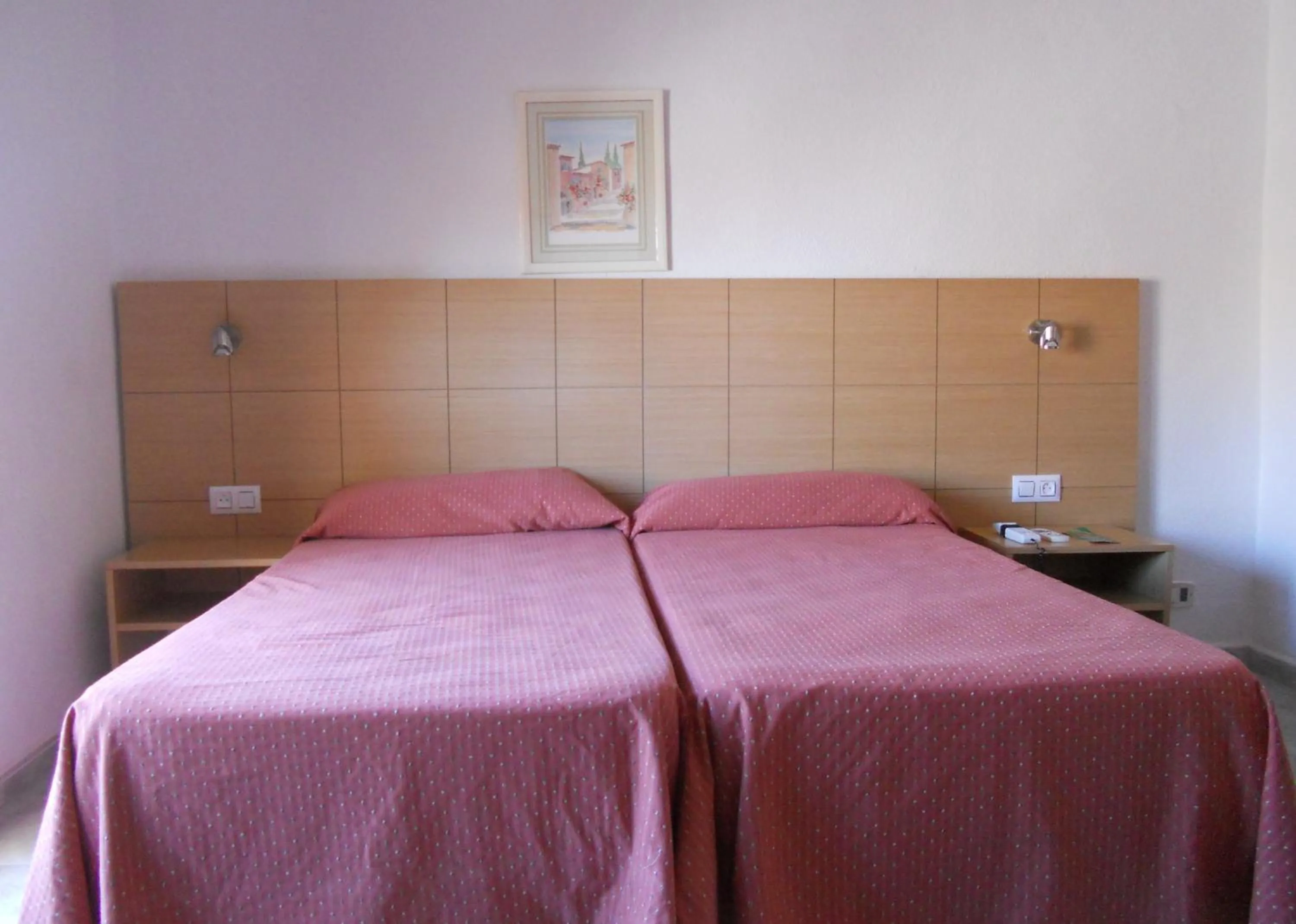 Bed in Hotel Sacratif