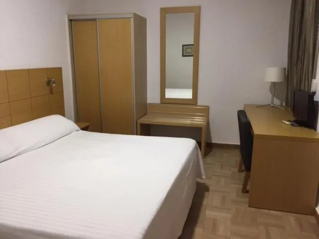 Bed in Hotel Sacratif