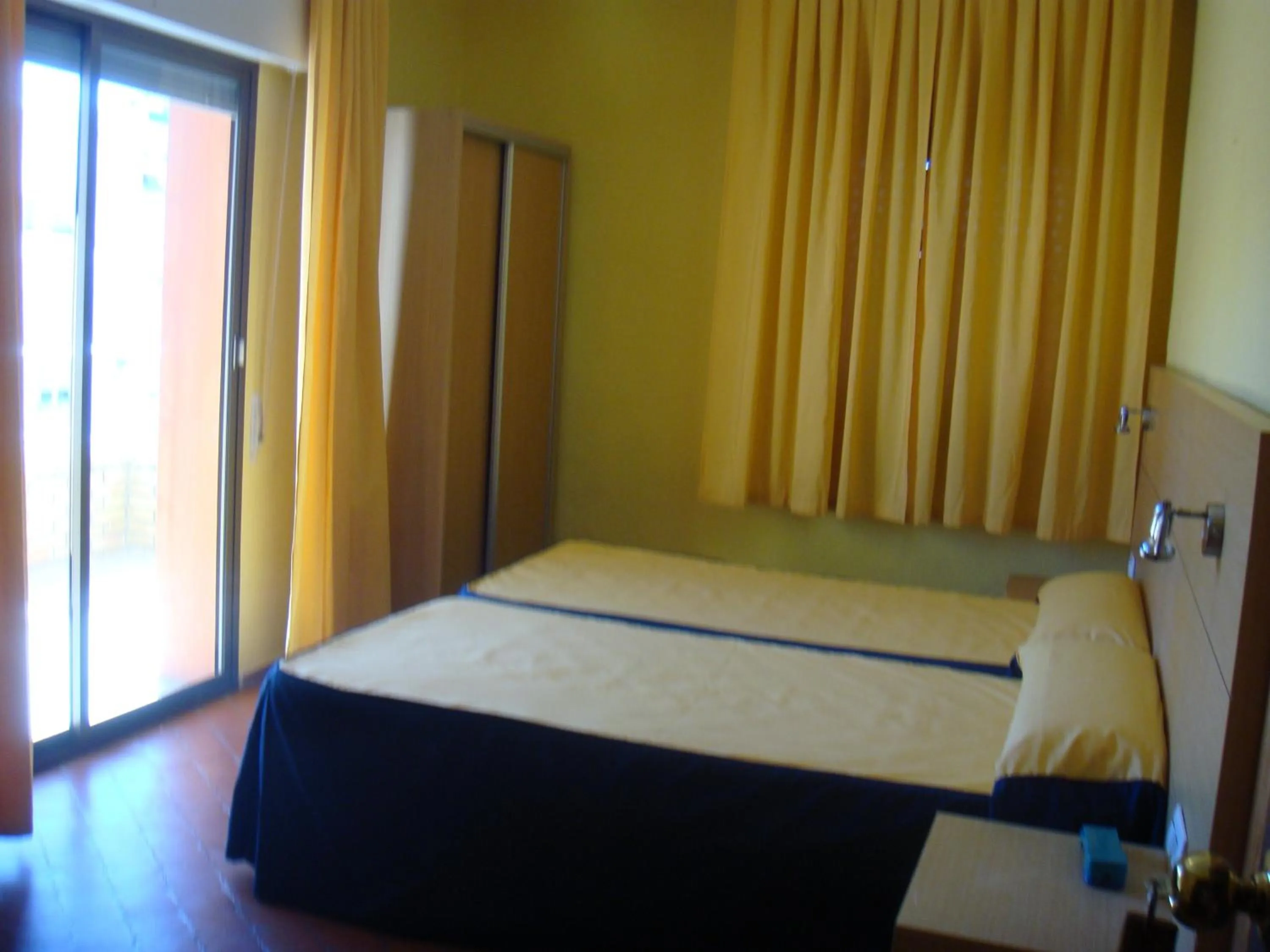 Bed in Hotel Sacratif