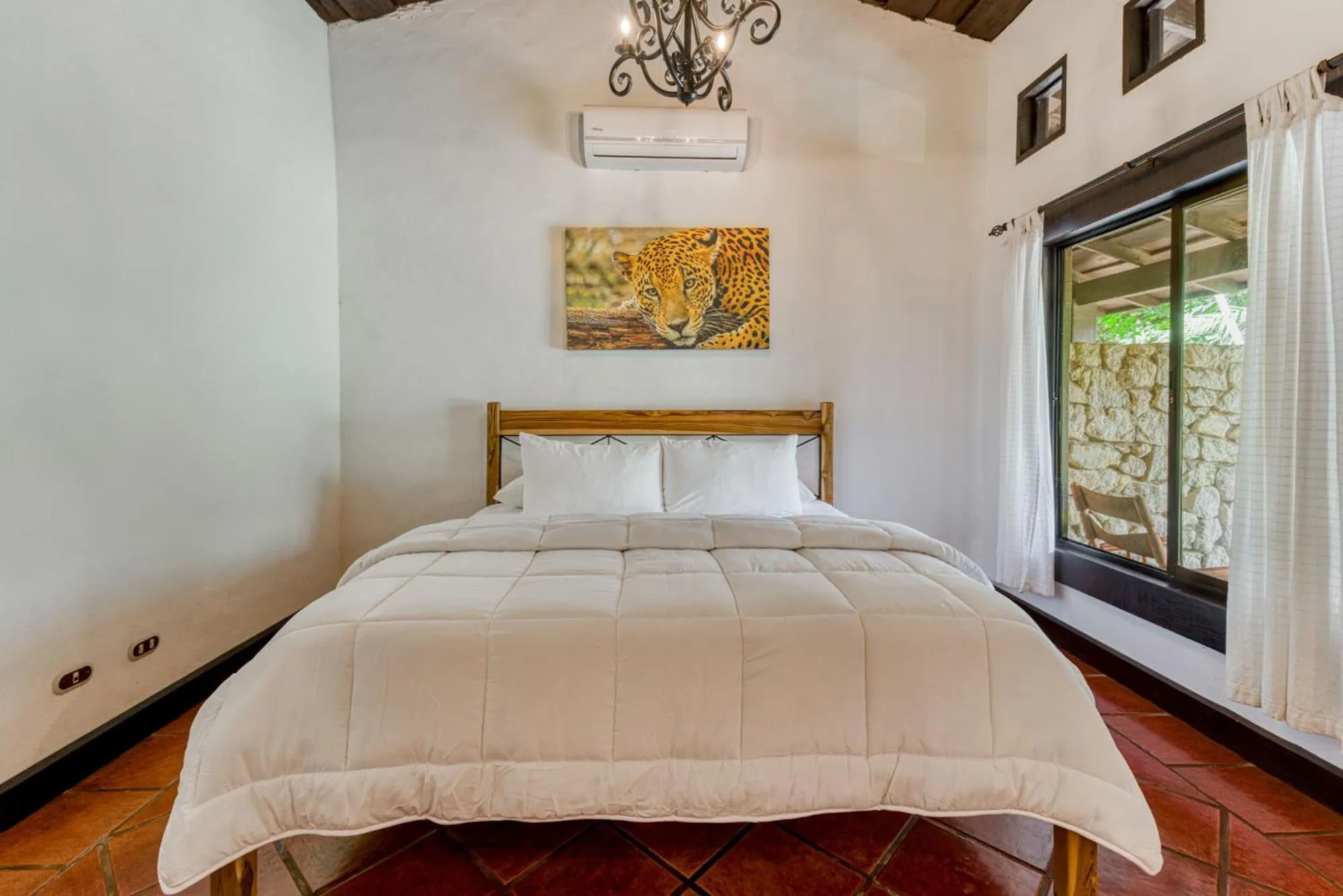 Bed in Hacienda La Pacífica Eco-Lodge