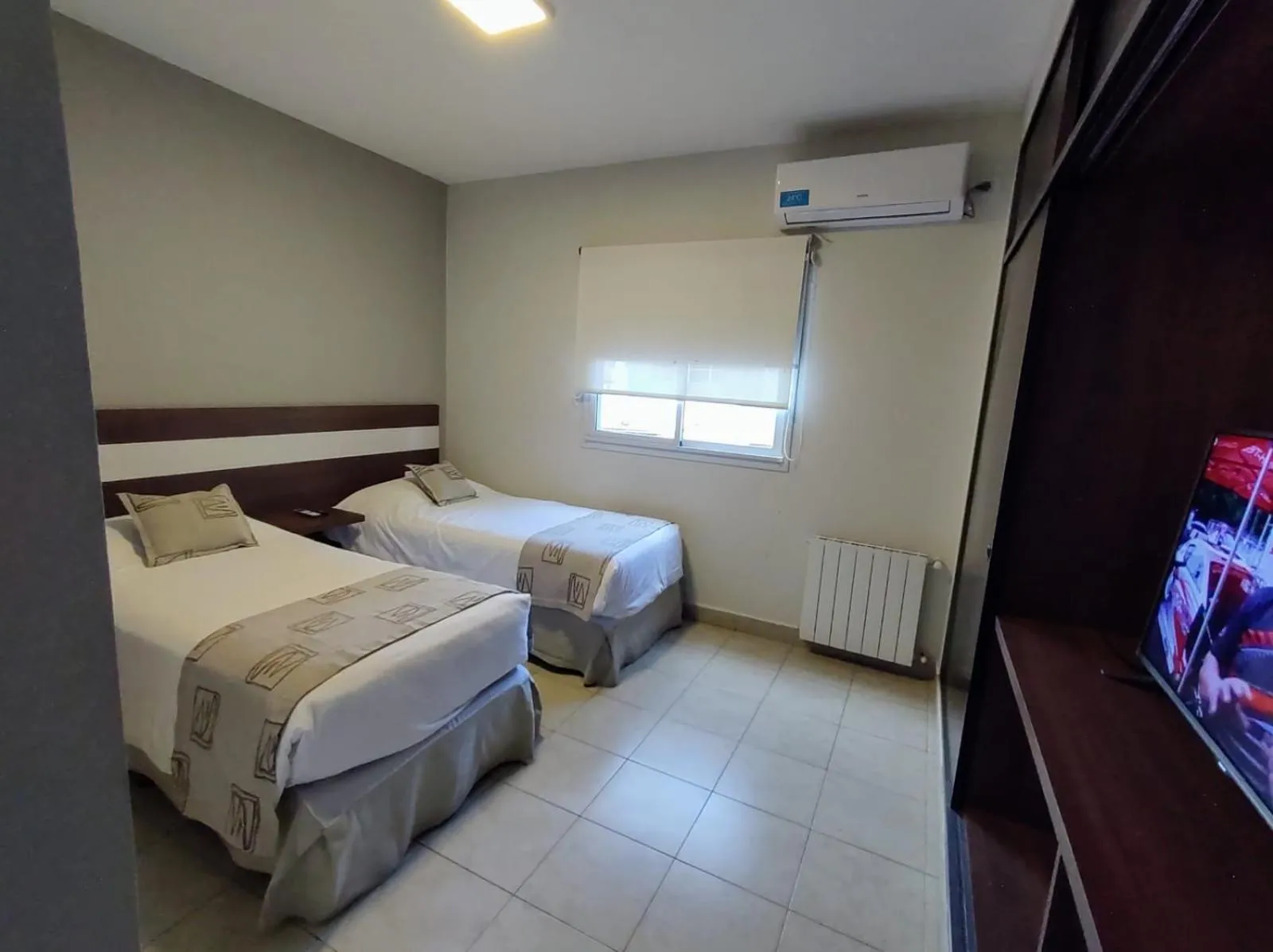 Bed in Urquiza Suites Salta