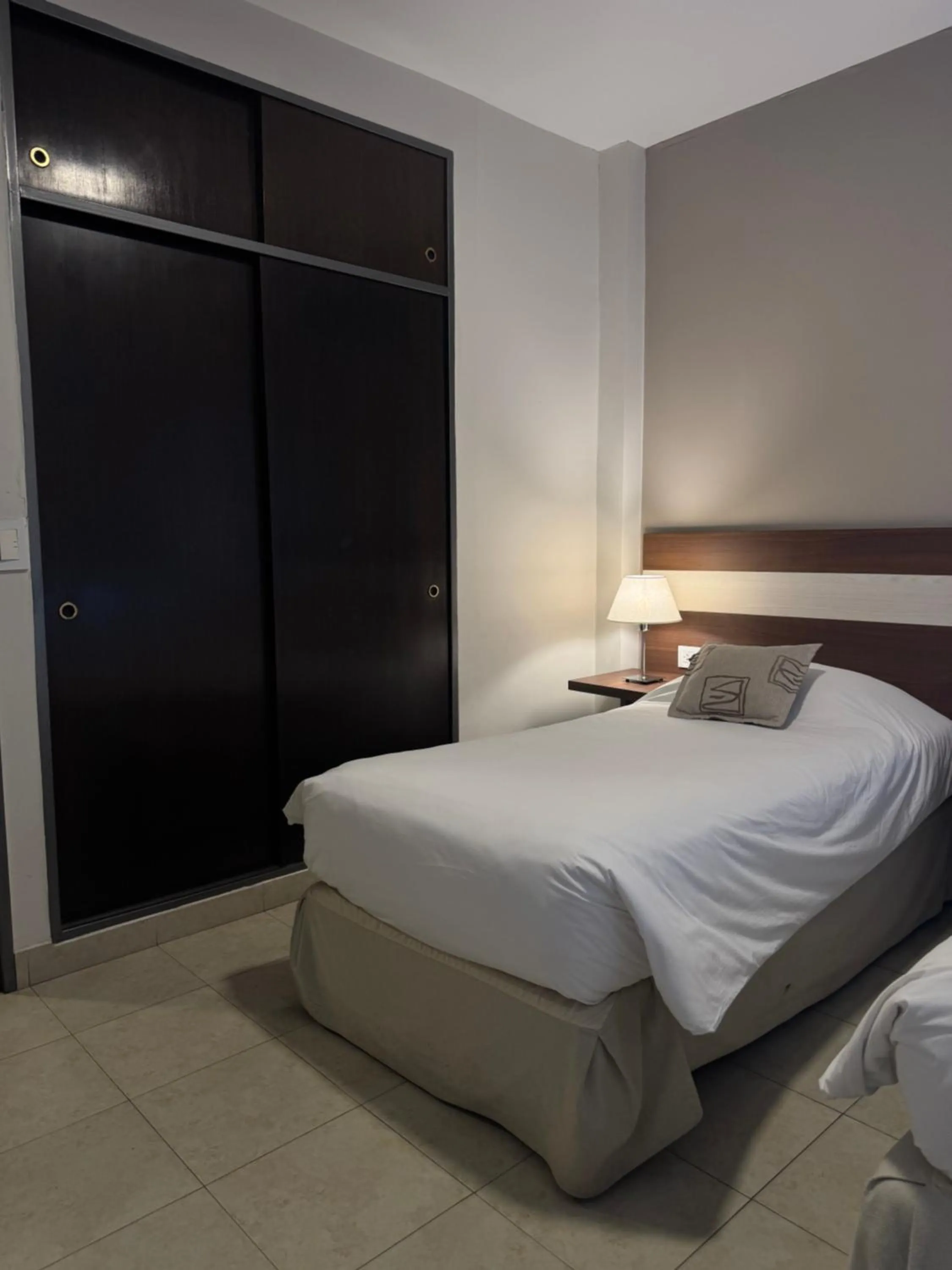 Bed in Urquiza Suites Salta