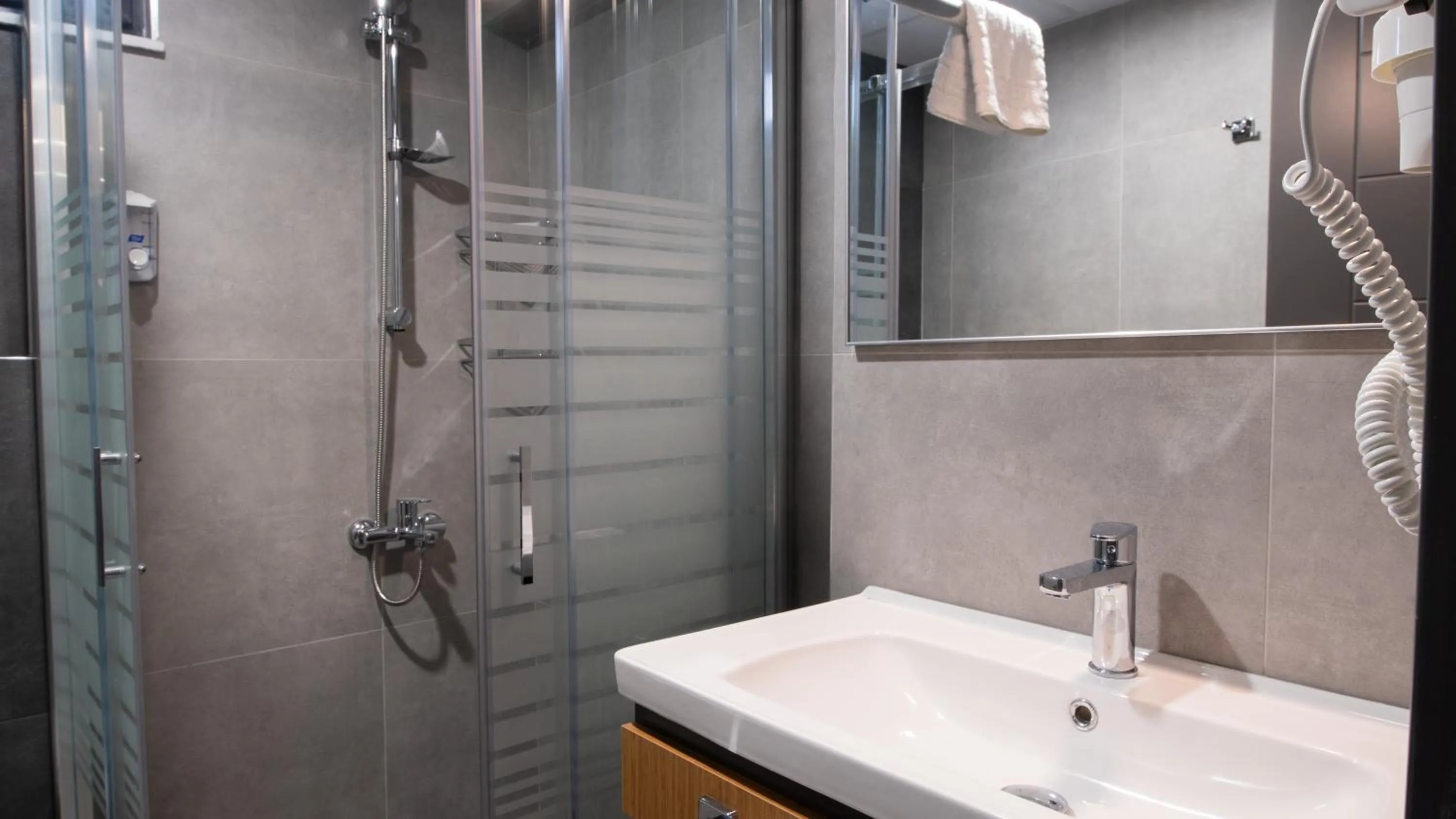 Bathroom in OPERA SUITES Apart Hotel