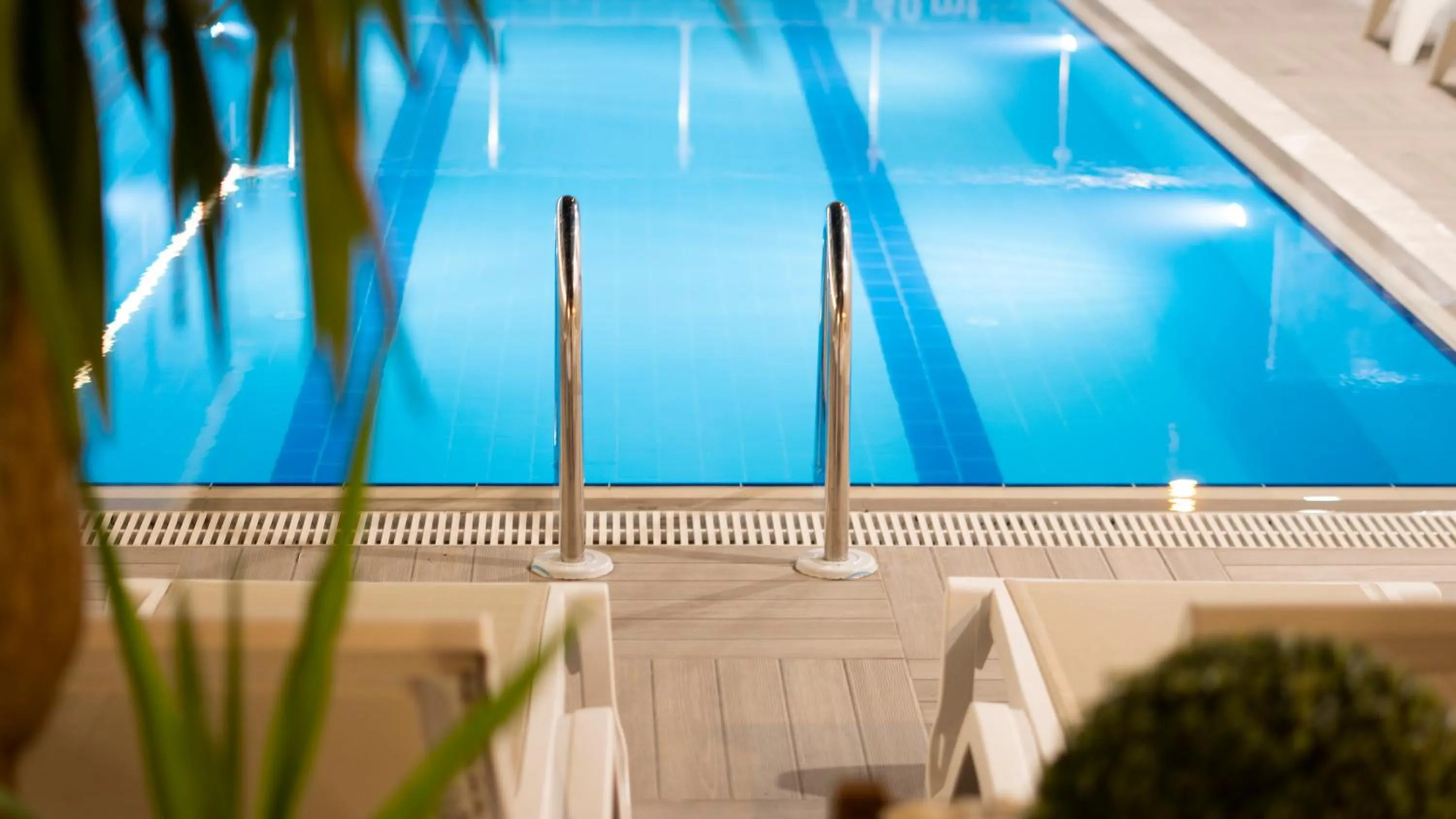 Pool view in OPERA SUITES Apart Hotel