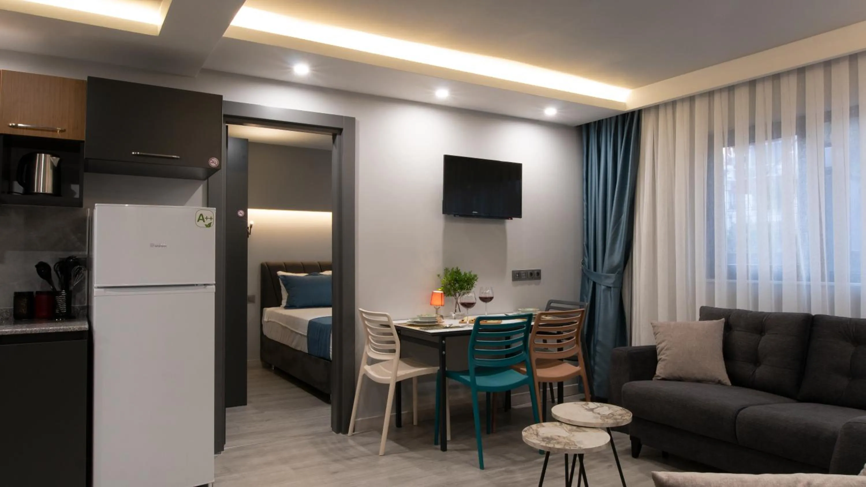 TV and multimedia, Bed in OPERA SUITES Apart Hotel