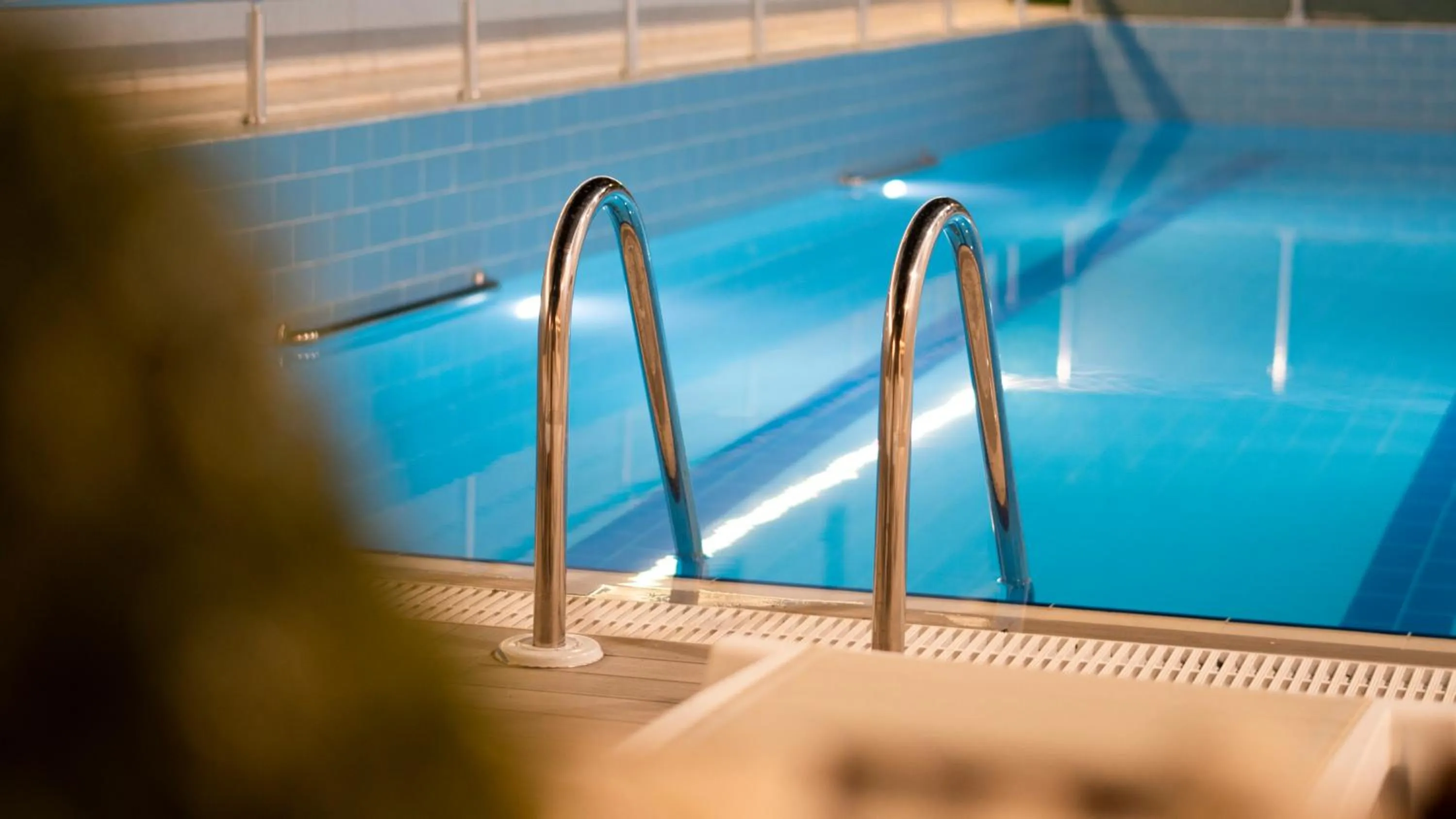 Pool view in OPERA SUITES Apart Hotel
