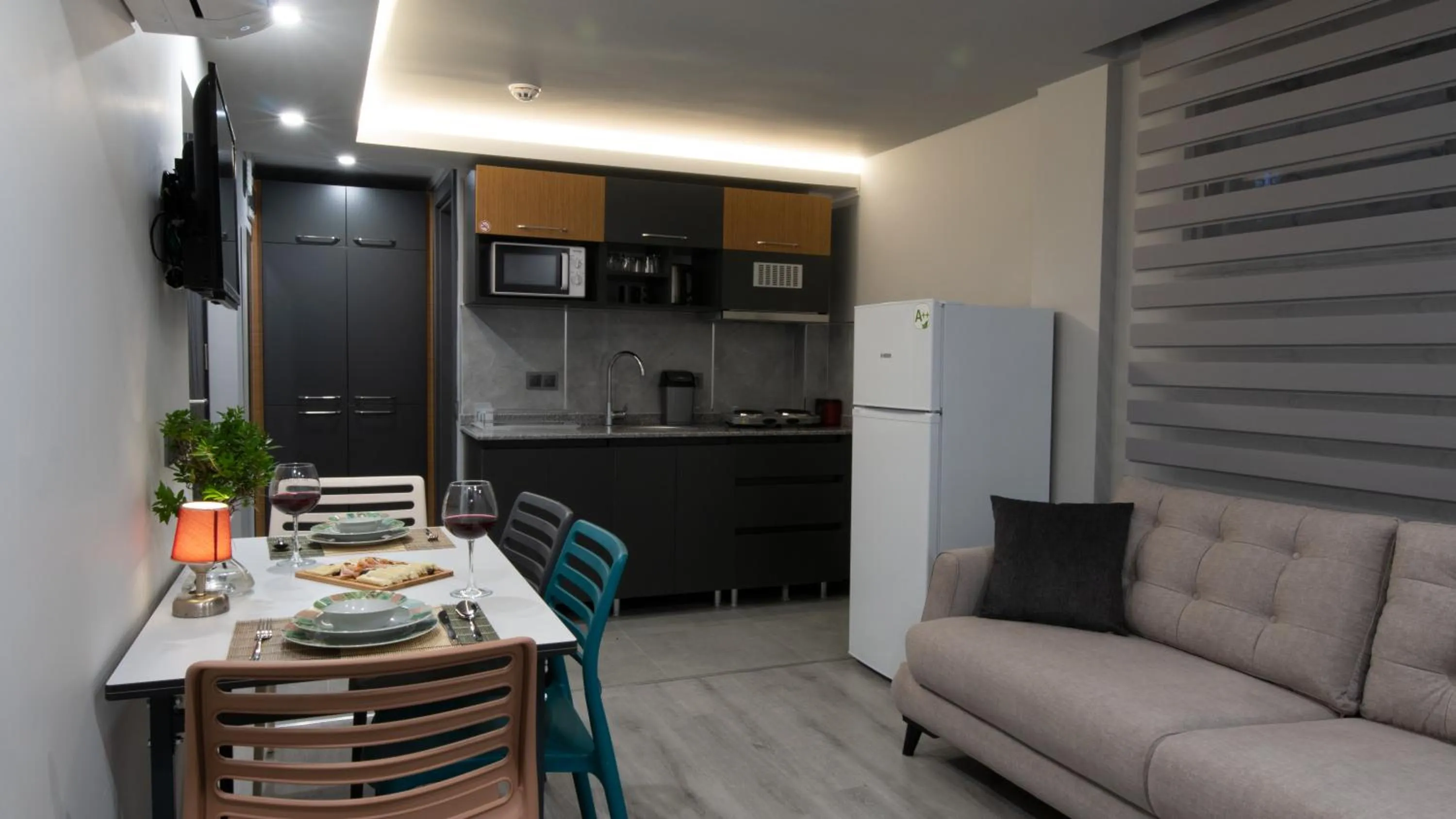 Kitchen or kitchenette in OPERA SUITES Apart Hotel