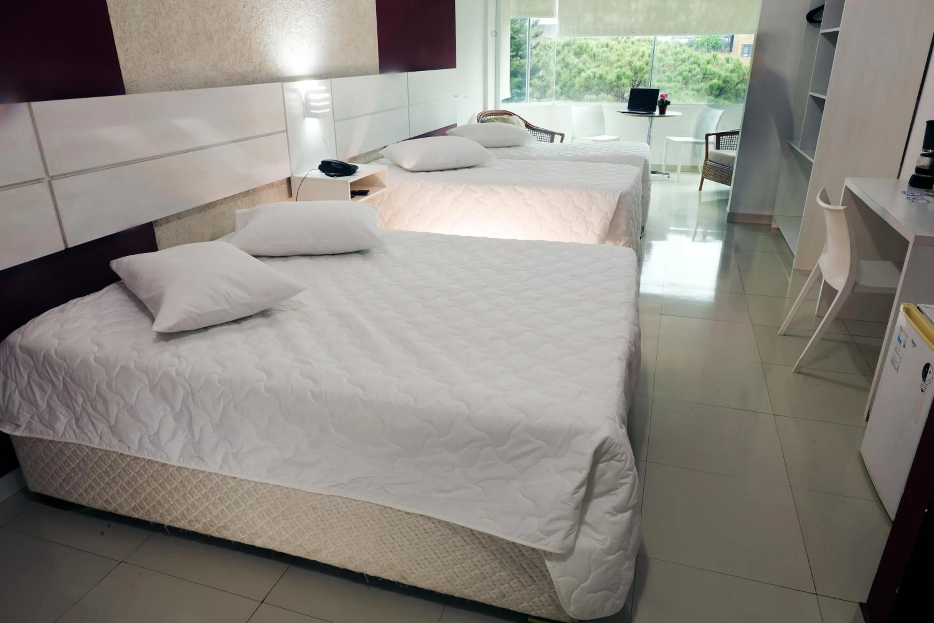 Bed in Emirates Hotel & Suites