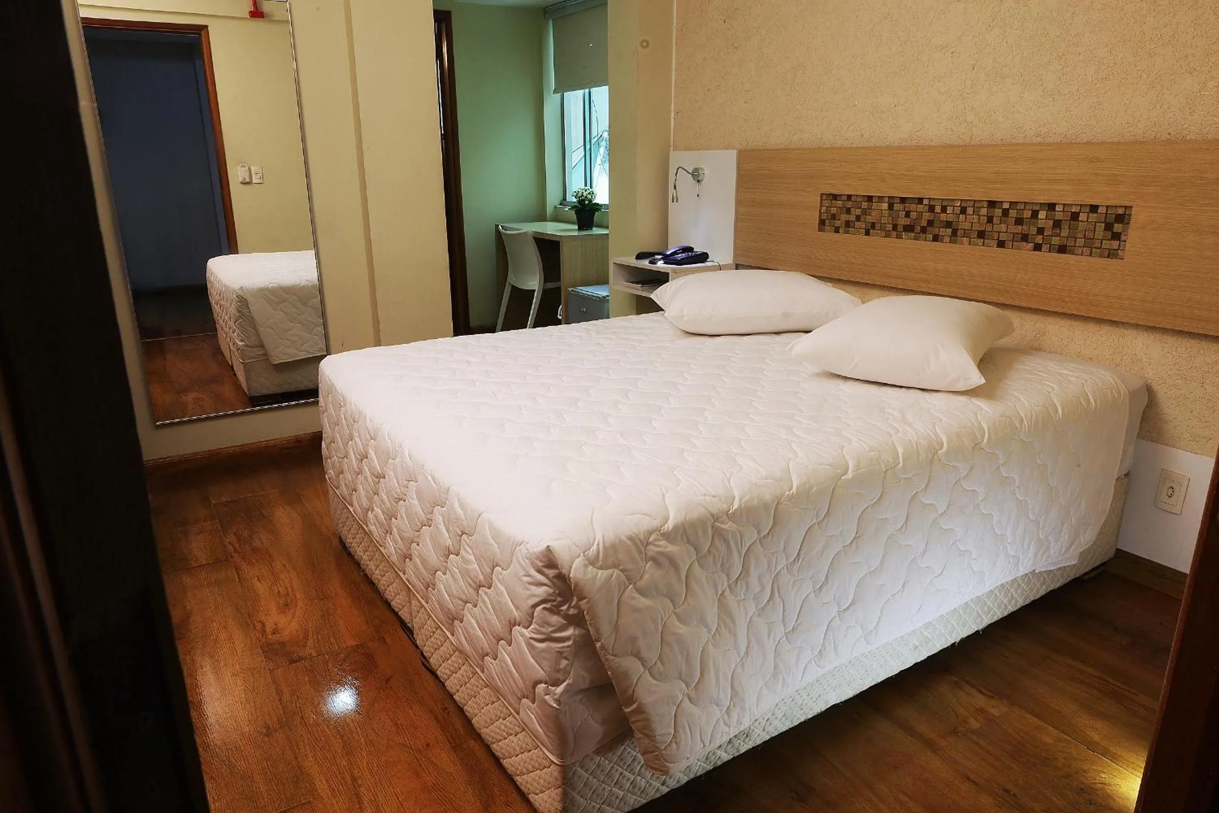 Bed in Emirates Hotel & Suites