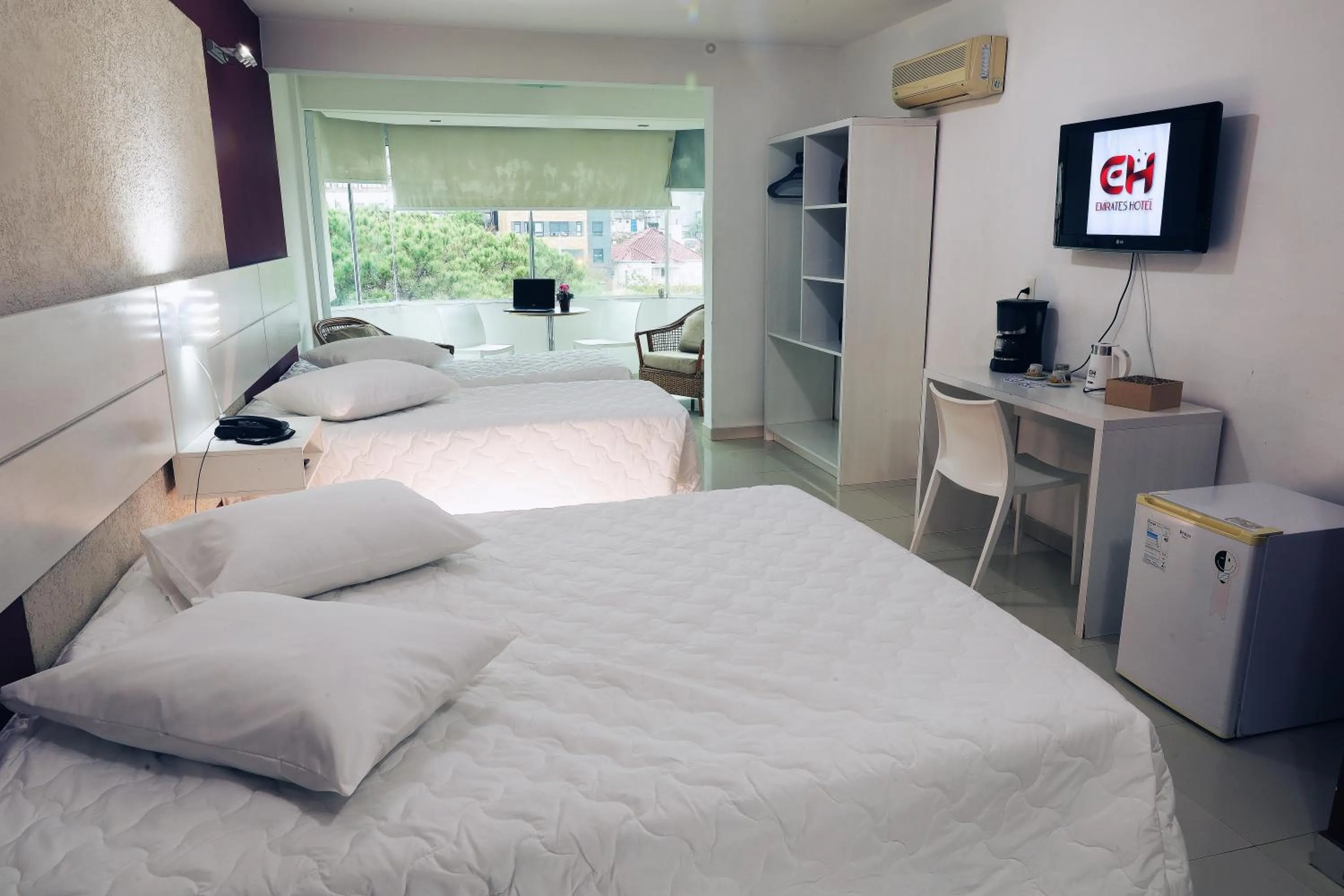 Bed in Emirates Hotel & Suites