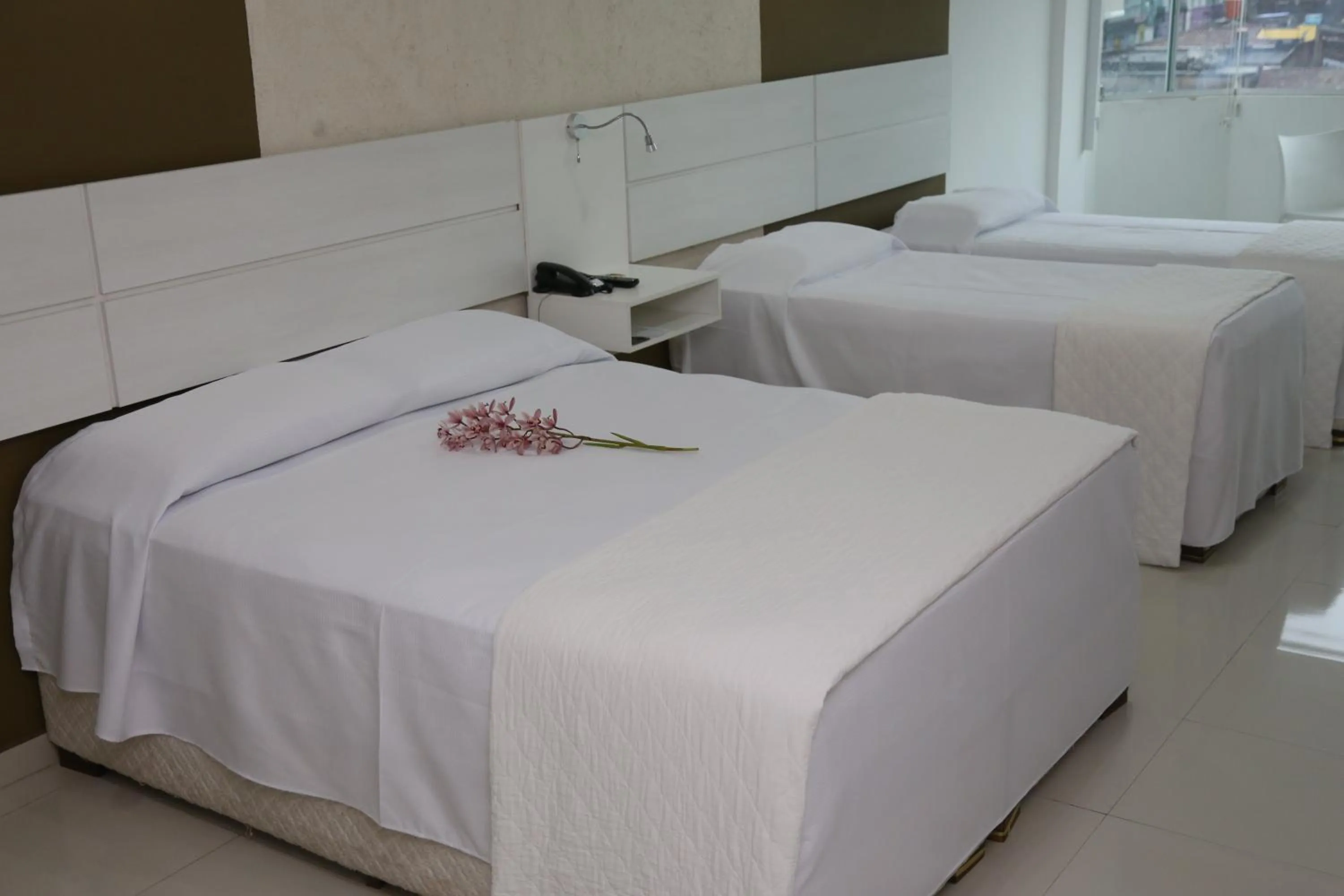 Bed in Emirates Hotel & Suites