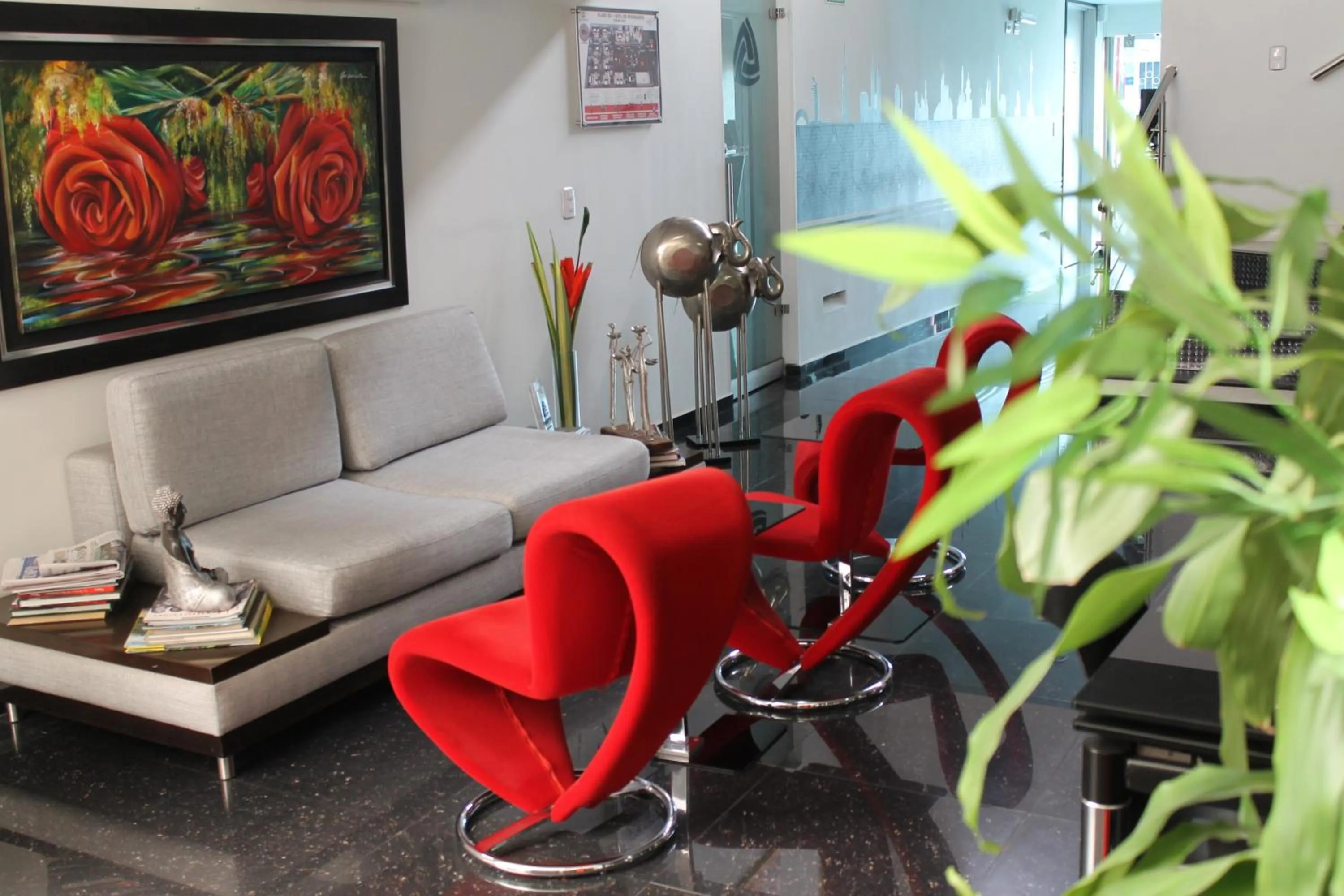 Communal lounge/ TV room in La Cabrera Hotel Boutique