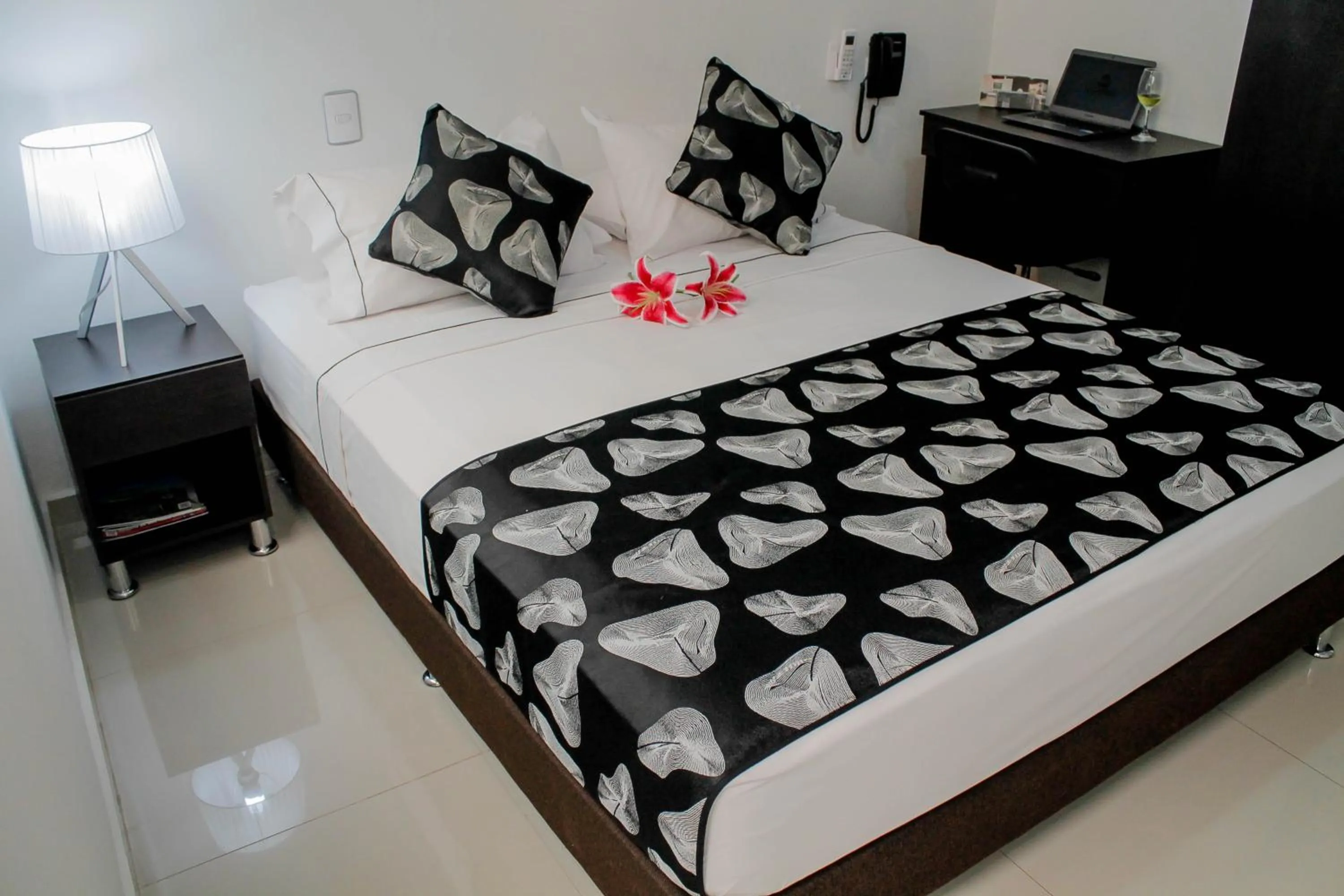 Seating area, Bed in La Cabrera Hotel Boutique