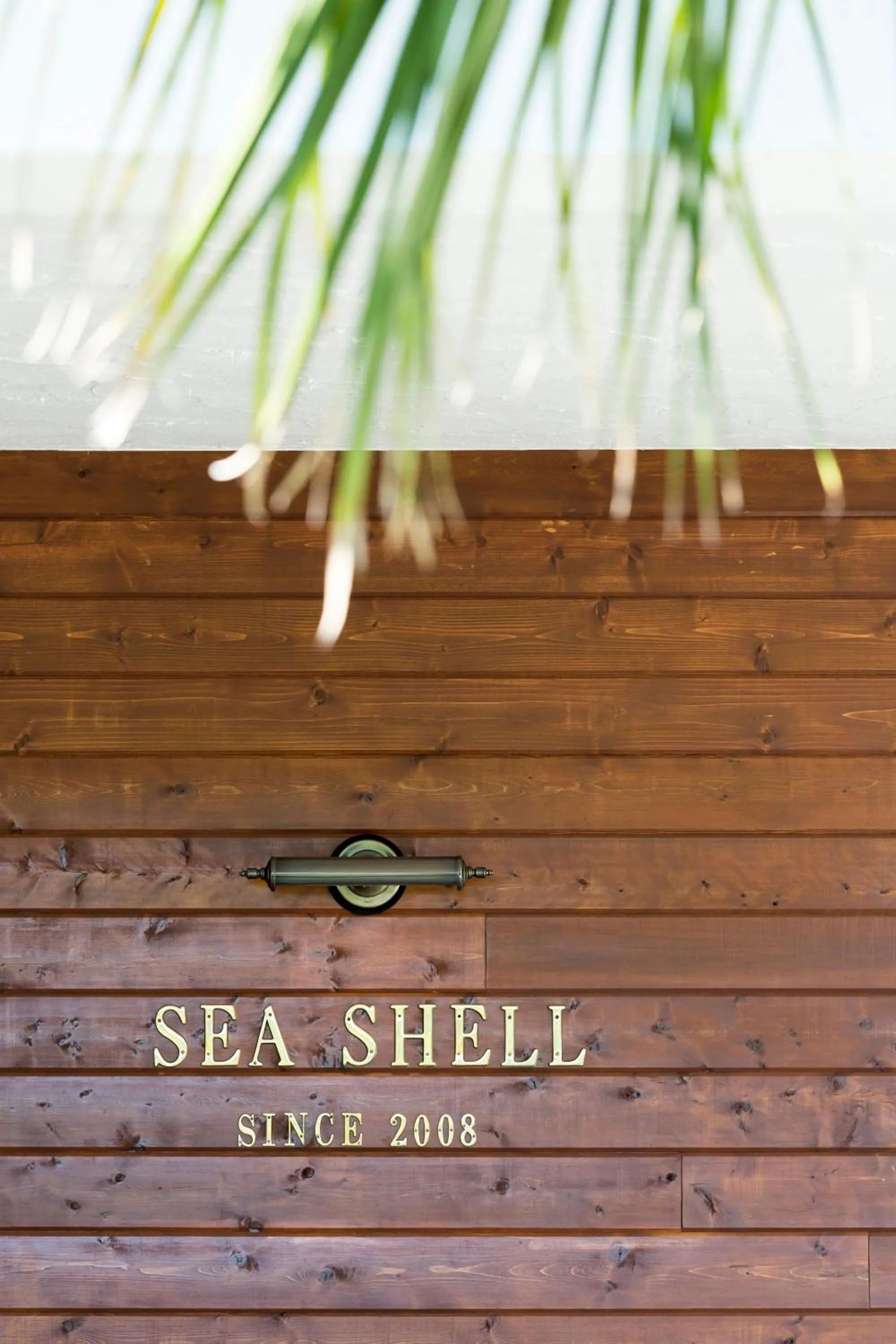 Property logo or sign in Hotel Sea Shell