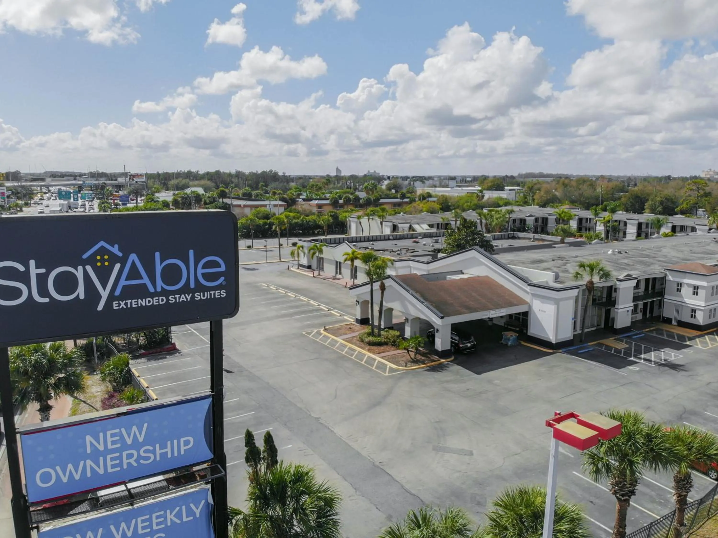 Property logo or sign in Stayable Orlando at Florida Mall