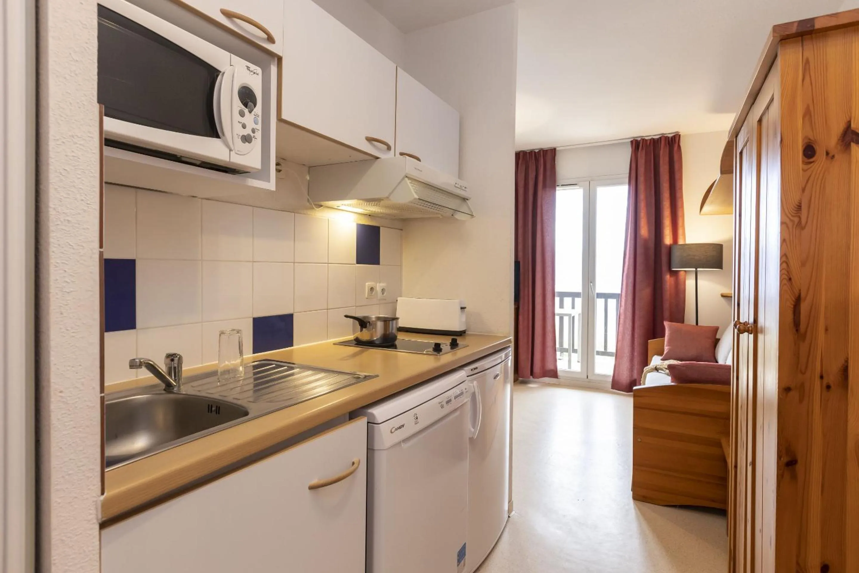 Kitchen or kitchenette in Résidence Odalys Mille Soleils