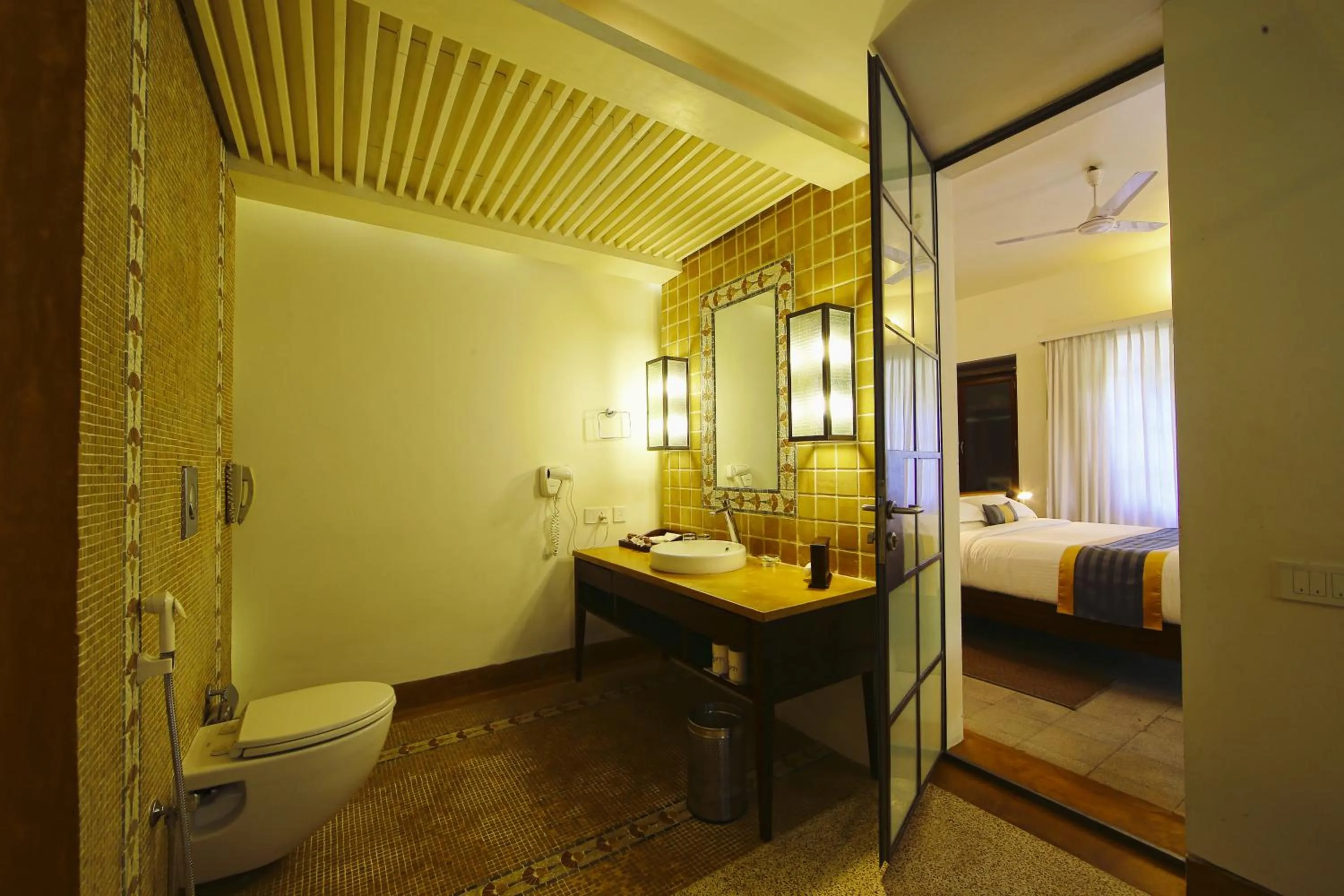 Bathroom, Bed in Eighth Bastion Fort Kochi - A CGH Earth Experience
