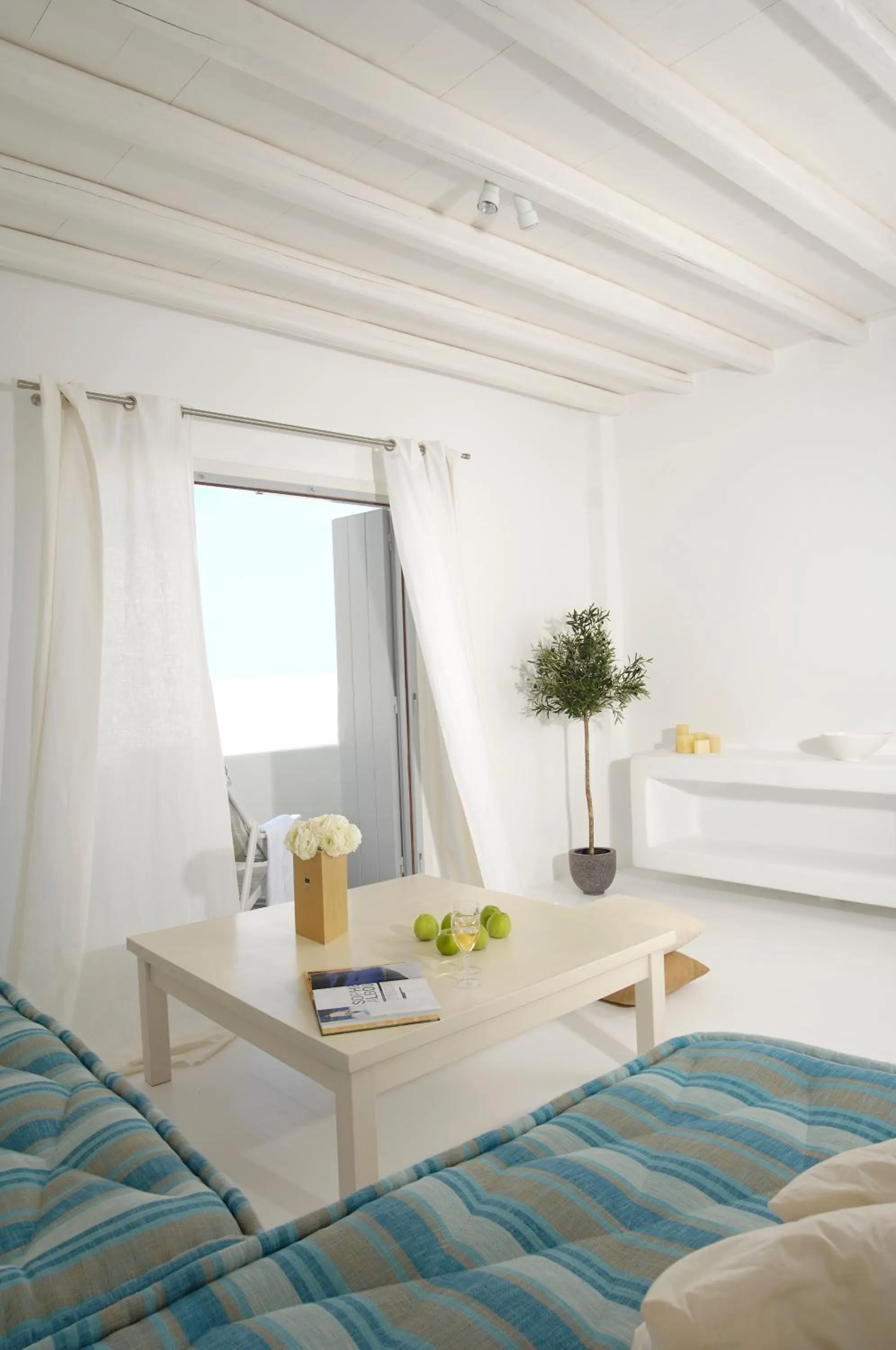 Living room, Bed in Kapetan Tasos Suites