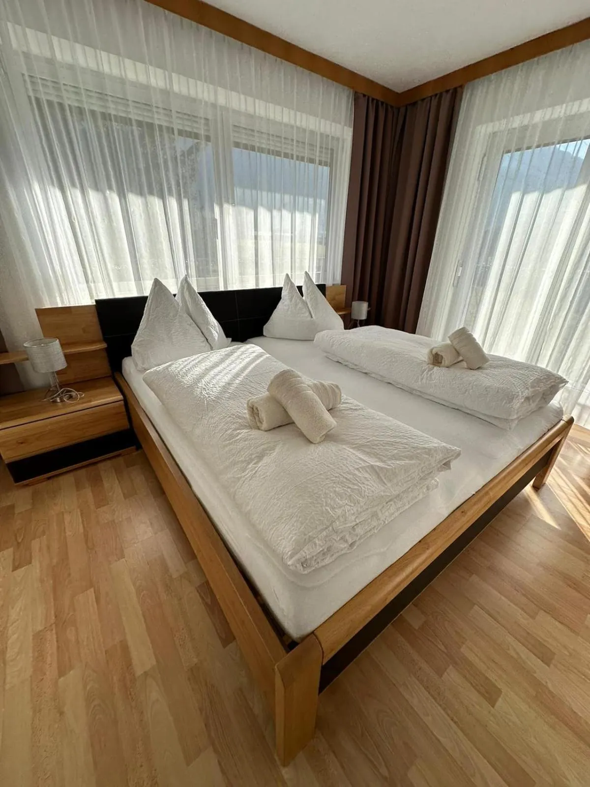 Photo of the whole room, Bed in Pension Alpina