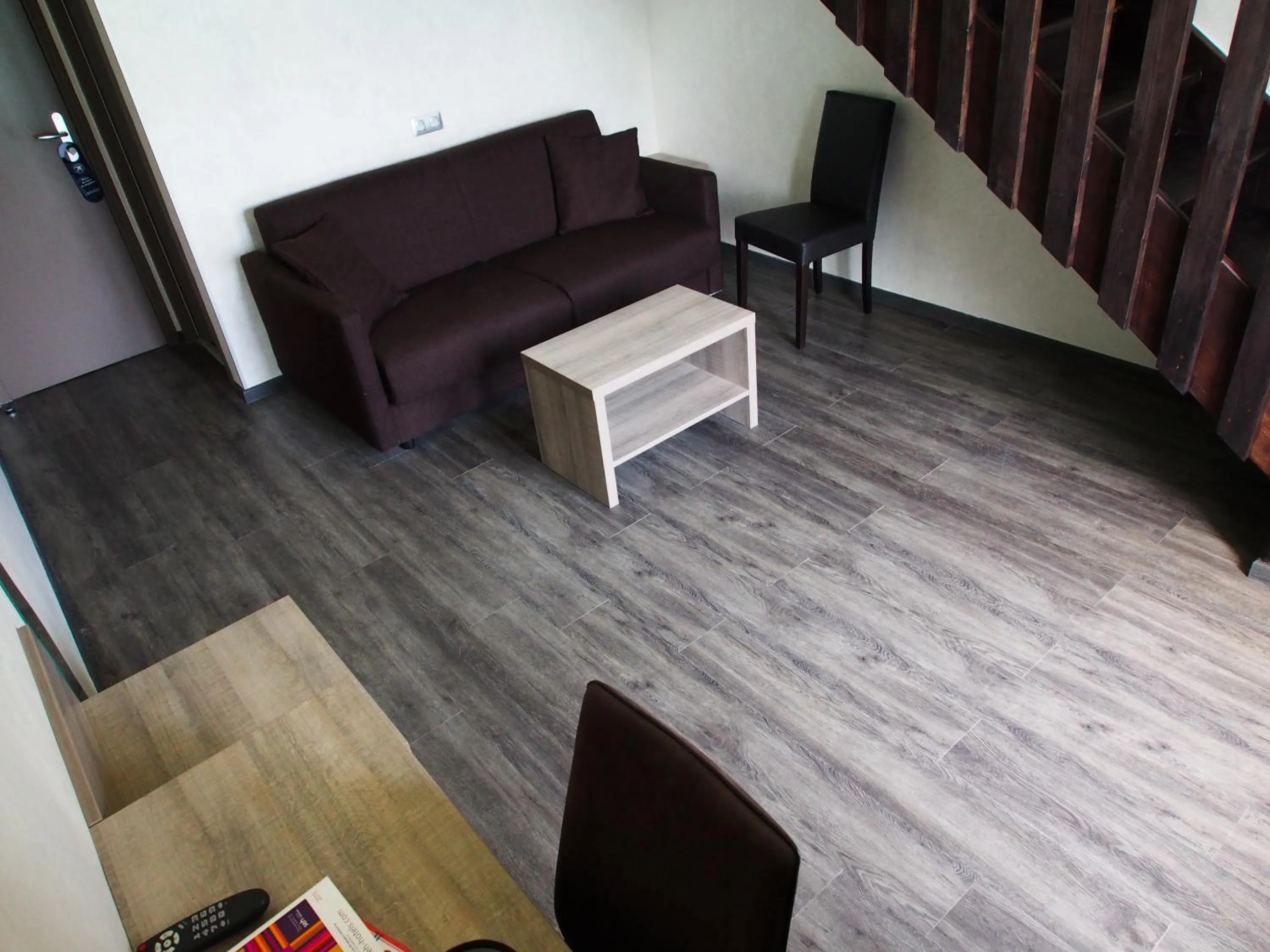 Seating area in Hôtel Beauregard, The Originals Relais